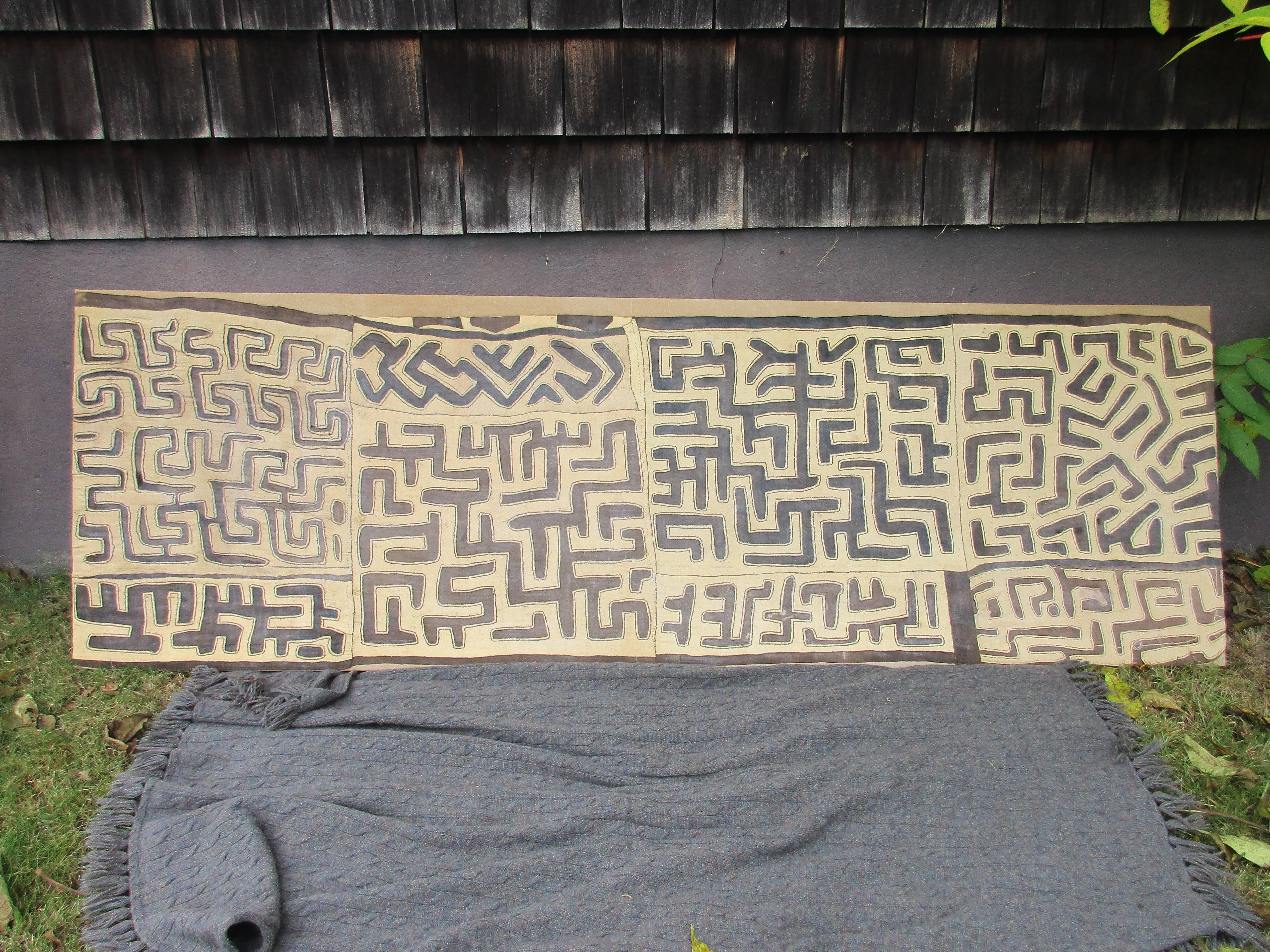 Antique brown and natural raffia African mounted Kuba weaving or textile. Measure: 8'.