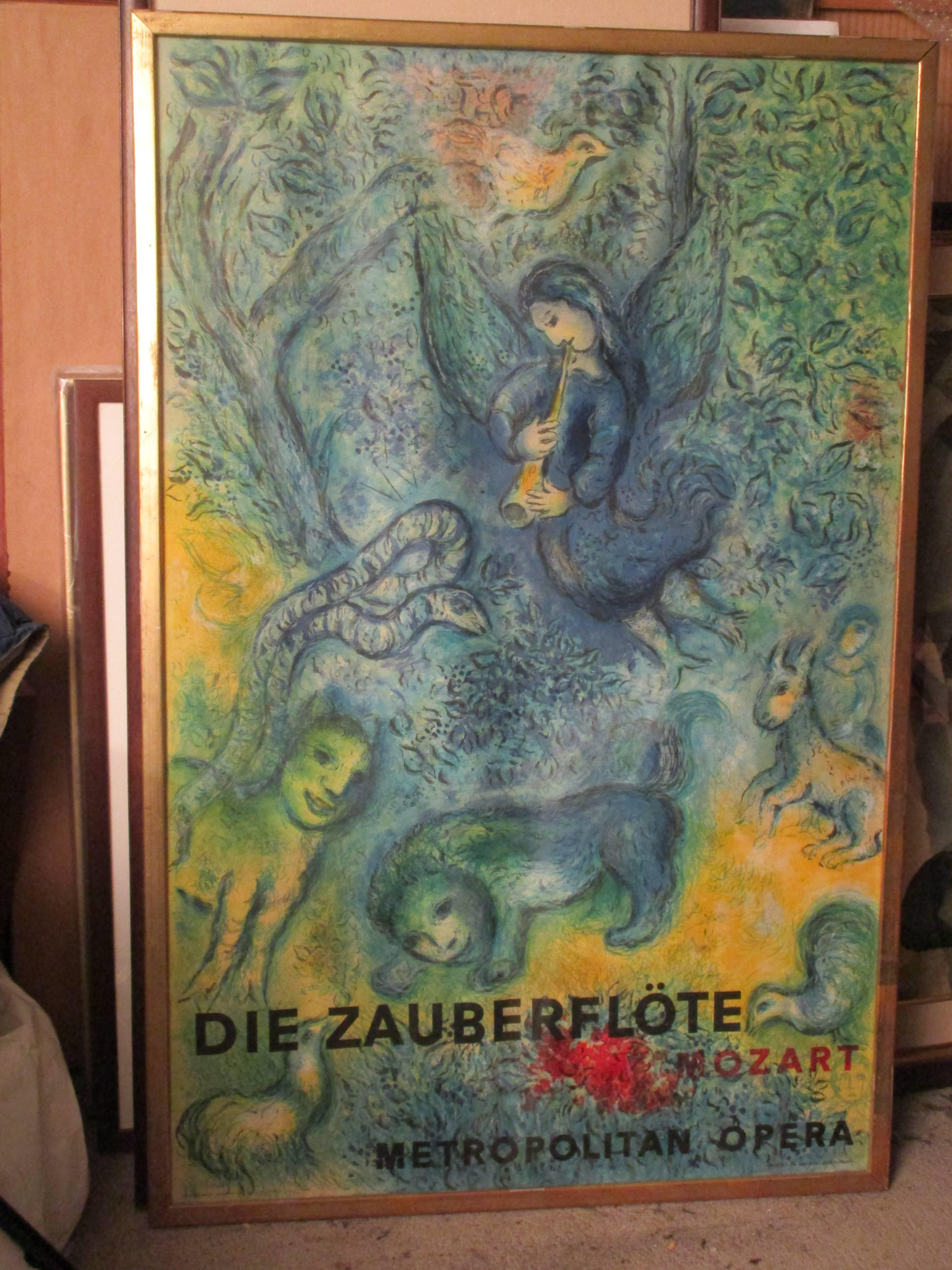 Marc Chagall 1960s metropolitan opera lithograph of Mozart's the magic flute in a gilt frame under glass.