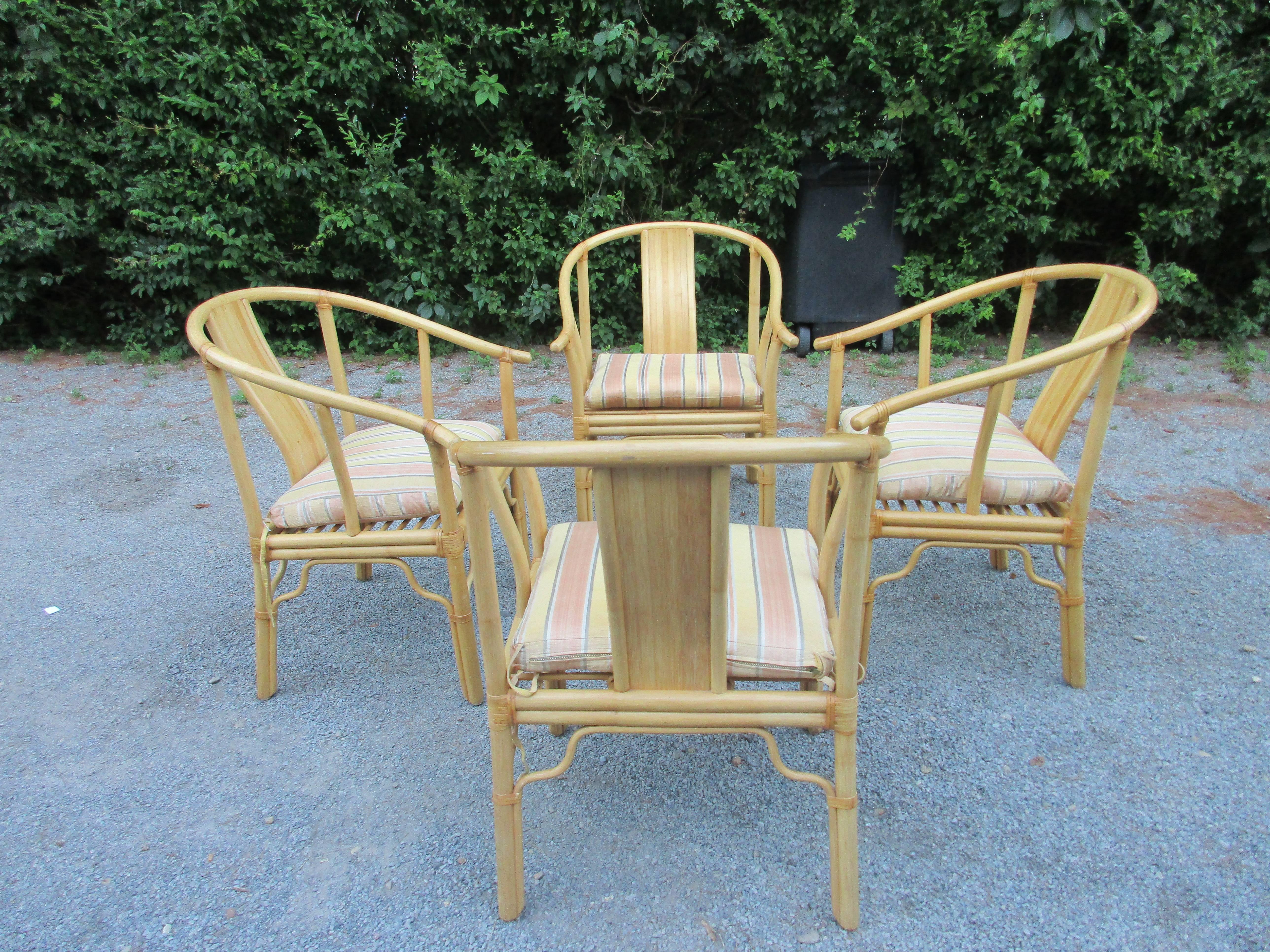 Set of four-light bamboo armchairs with custom cushions....price is for the set