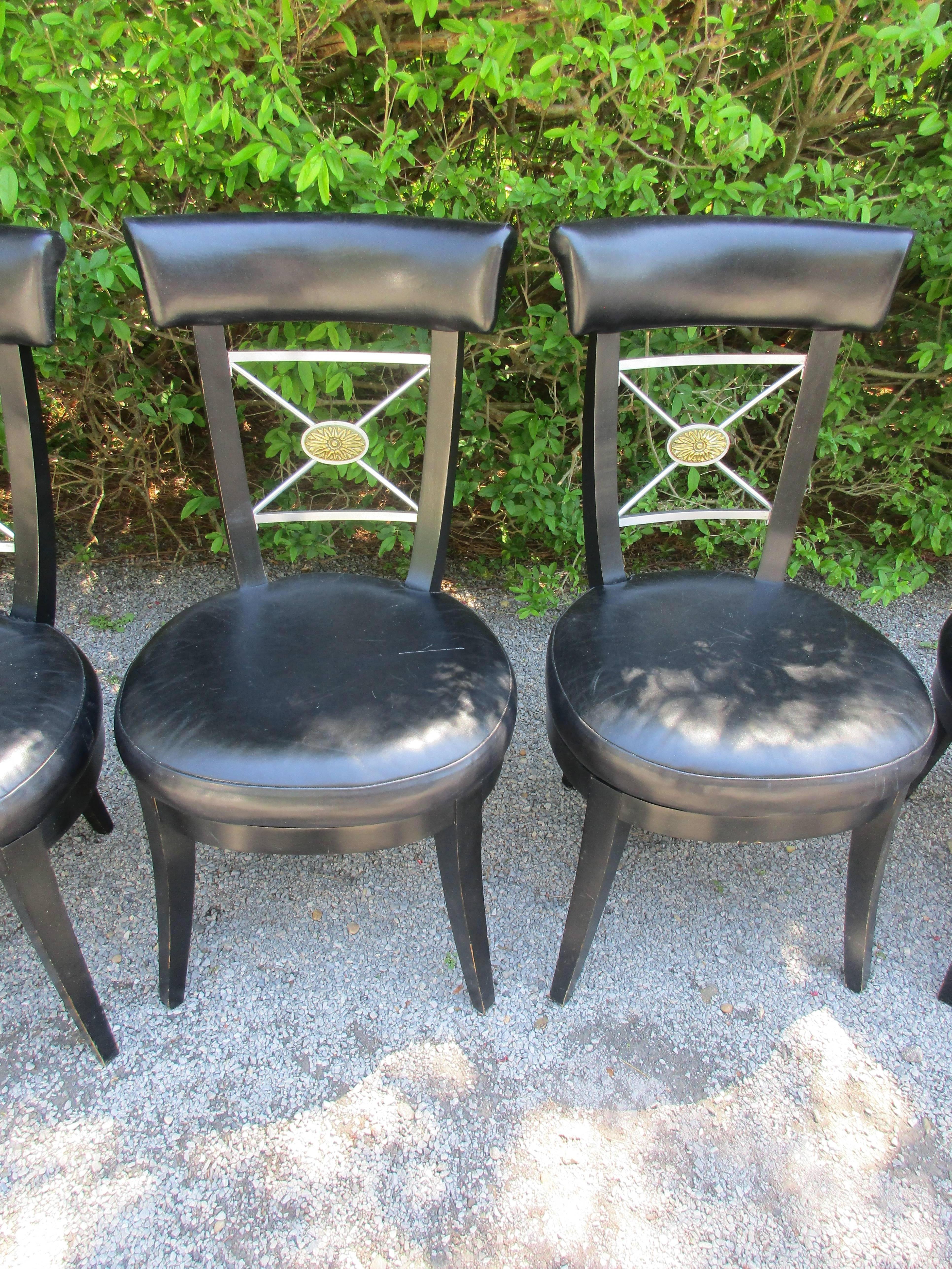 Unusual set of six ebonized wood. black leather and silvered bronze mid century neoclassical dining chairs  arm with 22