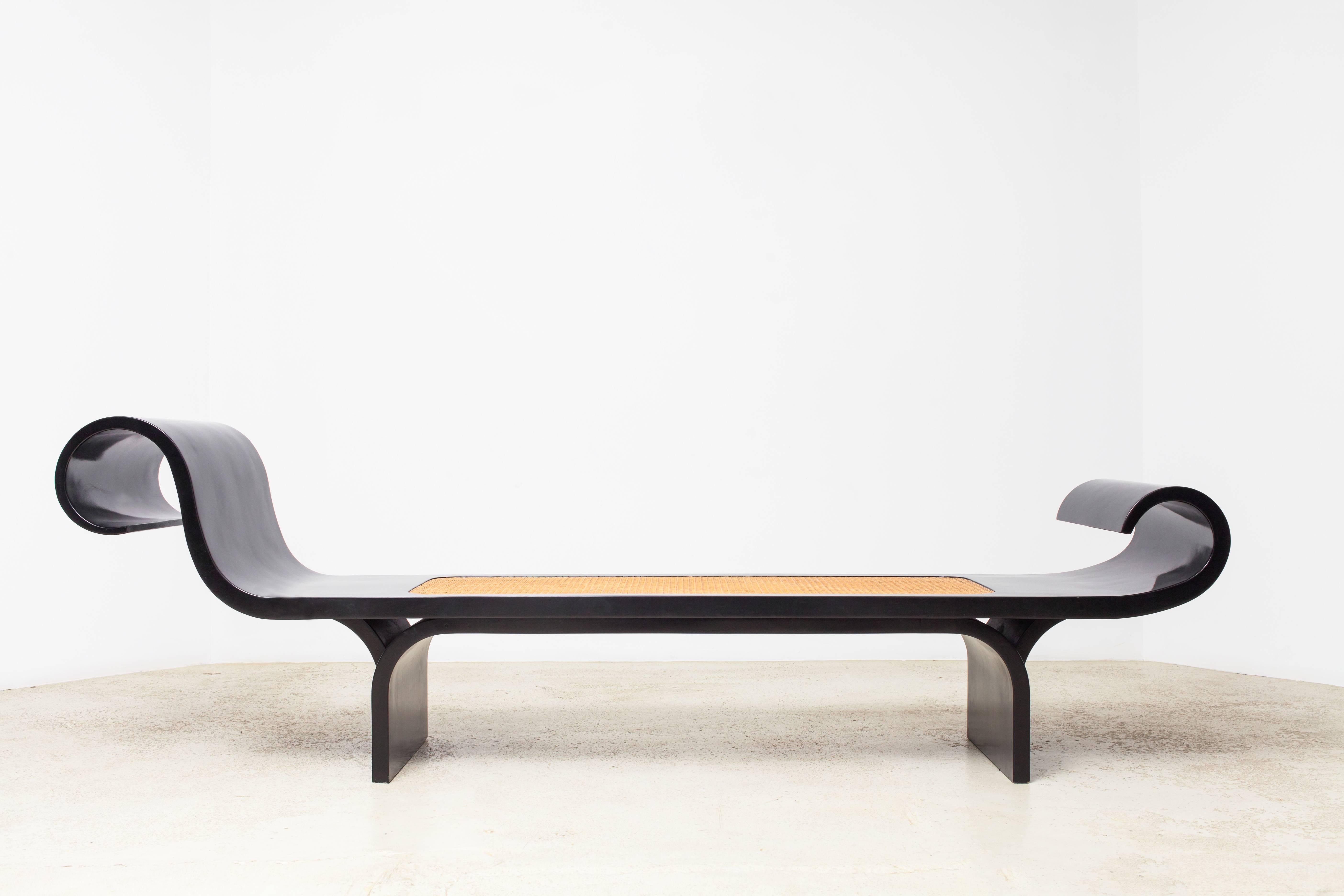 Originally designed in 1974 by Oscar Niemeyer and his daughter Anna Maria Niemeyer, the Marquesa bench is exemplary of Niemeyer’s exquisite curves and sinuous forms made famous by his seminal modern architecture. Bearing an embedded seal certifying