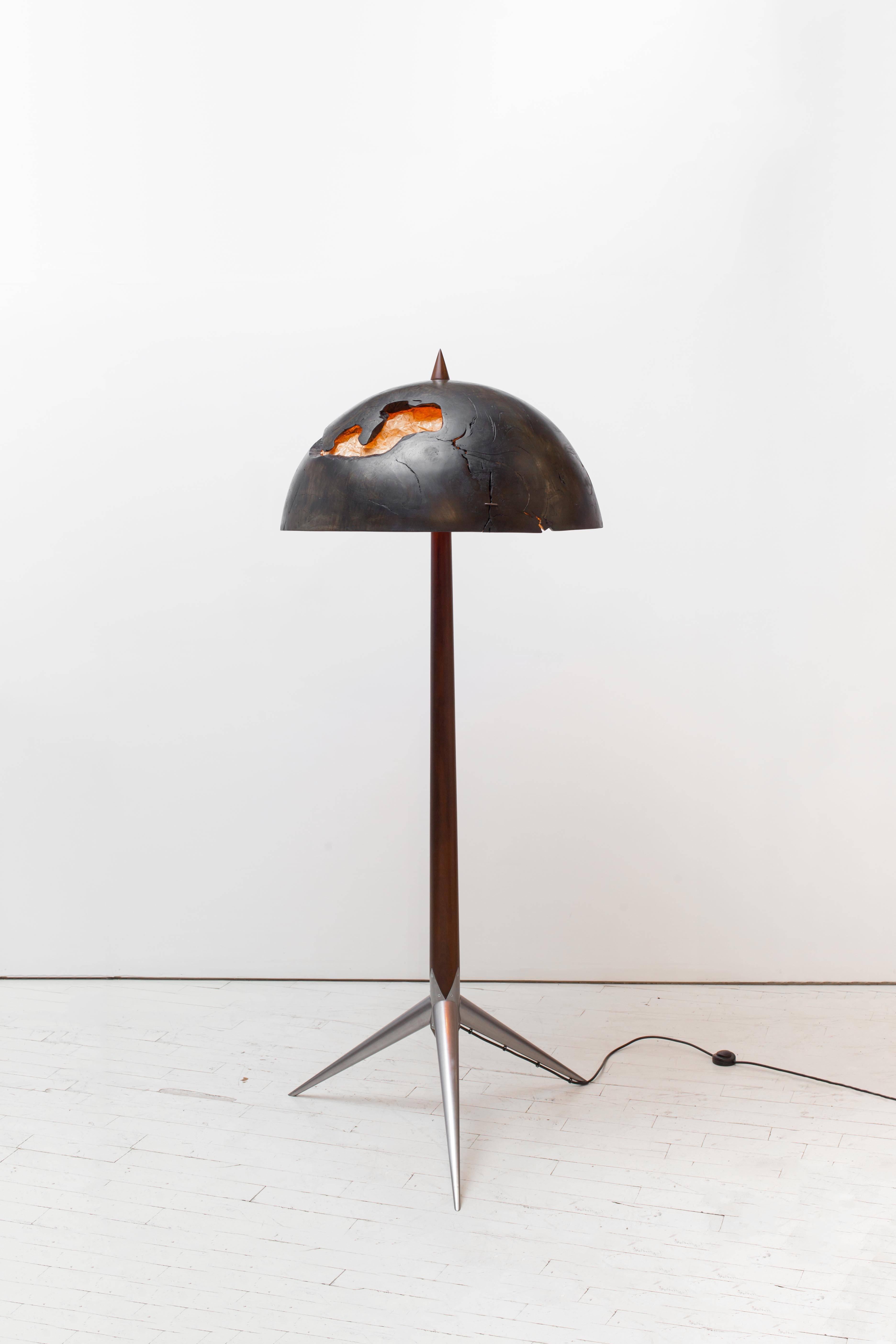 Koguma floor lamp designed in 2015 by Brazilian designer Carlos Motta.
Made in reclaimed Peroba Rosa wood stem, reclaimed mango wood shade, iron, and bronze screen.
Limited edition of 3.
