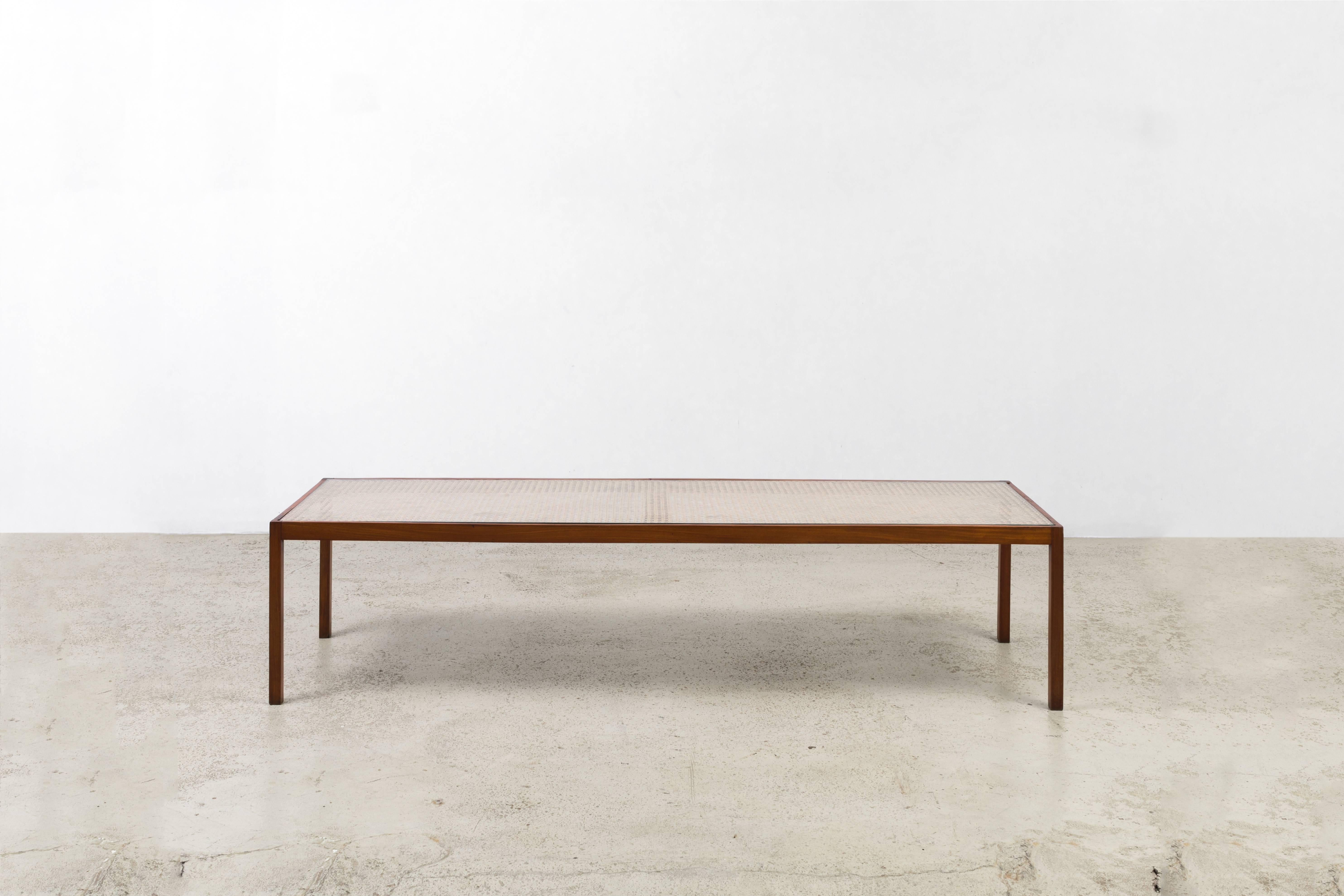 Vintage caviuna wood coffee table with glass top. Designed by Carlo Hauner in the 1950-1960s.
 