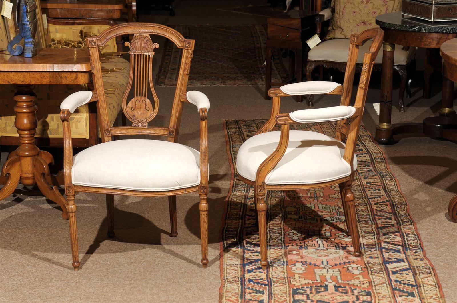 Italian neoclassical pair of ashwood armchairs with carved lyre splat, circa 1790.