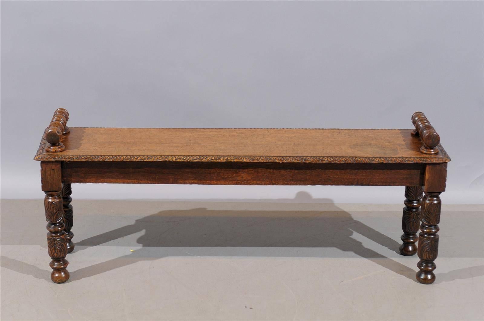 19th Century English Oak Hall Bench with Handles and Carved Decoration, circa 1890