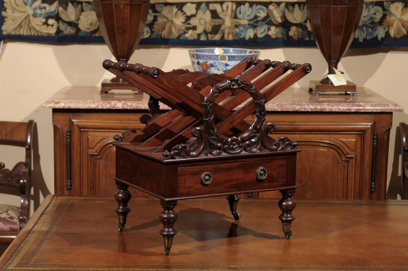 19th century English mahogany Canterbury with drawer and wreath design.