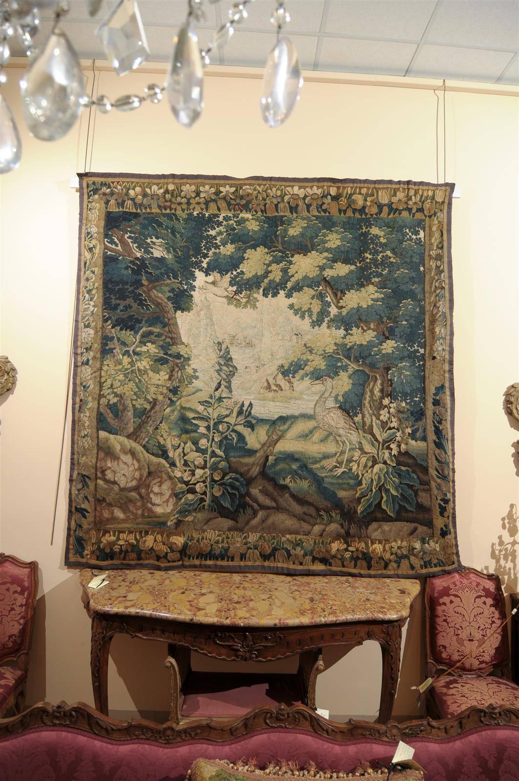 Large 18th century French Aubusson tapestry with bird, original border.
