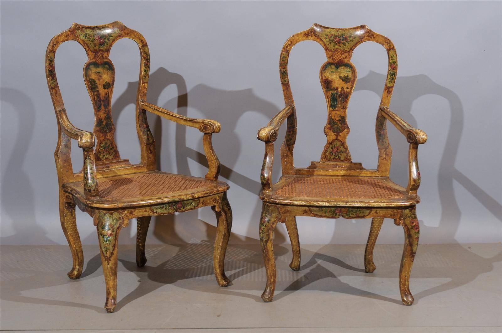 A pair of 18th century Venetian painted fauteuils with cane seats and floral decoration.

