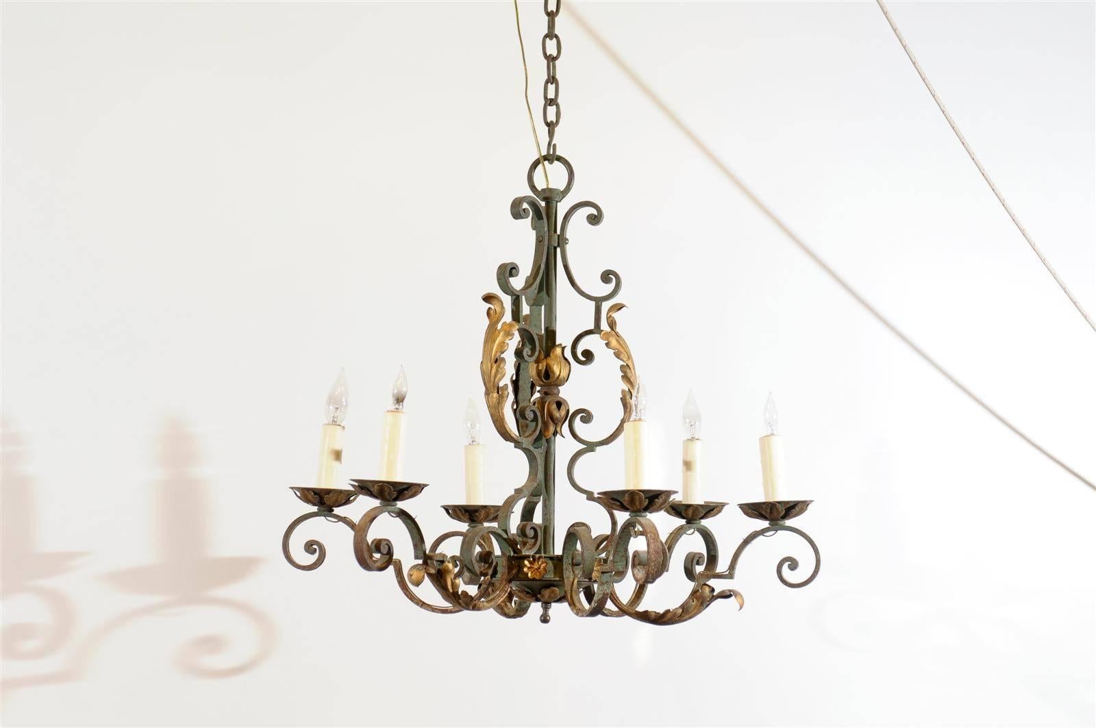 A French painted pale green iron and gilt 6-light chandelier with scroll design.