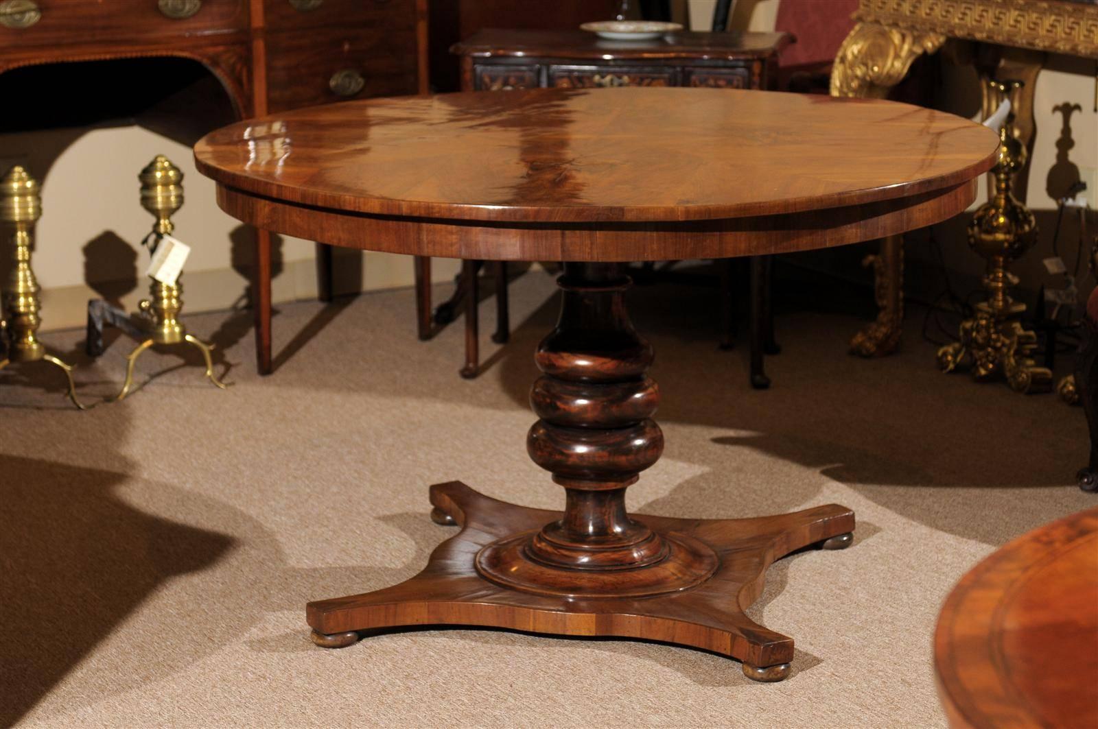 An Italian walnut center table with carved column base. 

William Word Fine Antiques: Atlanta's source for antique interiors since 1956. 

 