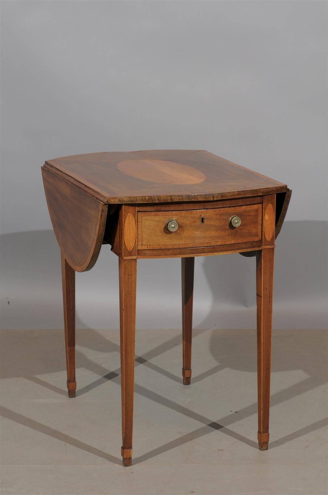 Late 18th century English George III mahogany pembroke table with inlay in satinwood.