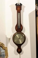 19th Century Barometer in Mahogany with Inlay, signed “W Tasker, Banbury”.