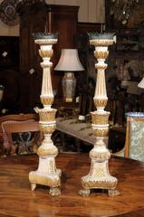 Pair of Continental Painted and Parcel-Gilt Candlesticks with Paw Feet