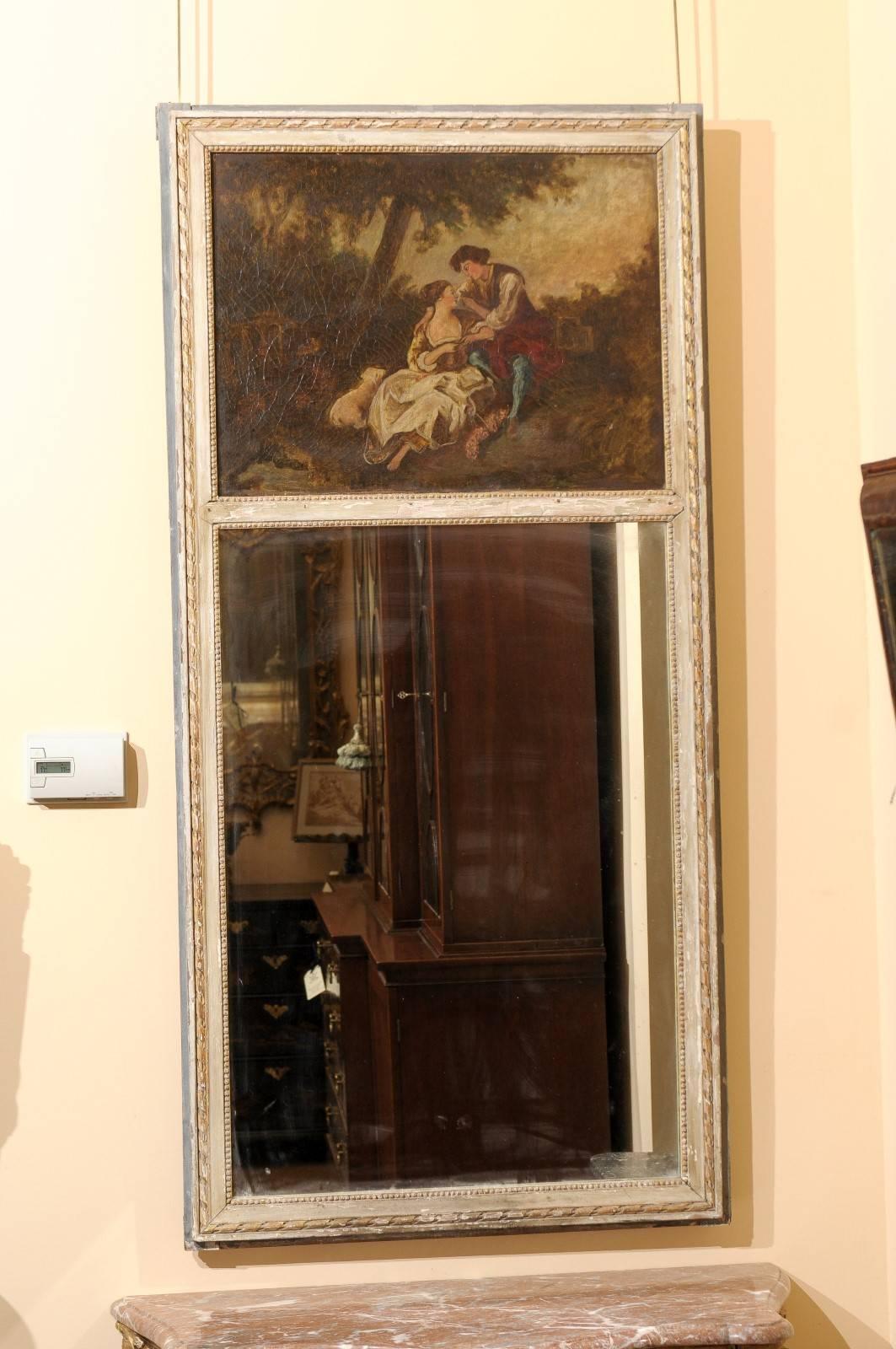 Early 19th century French trumeau mirror with oil on canvas painting.