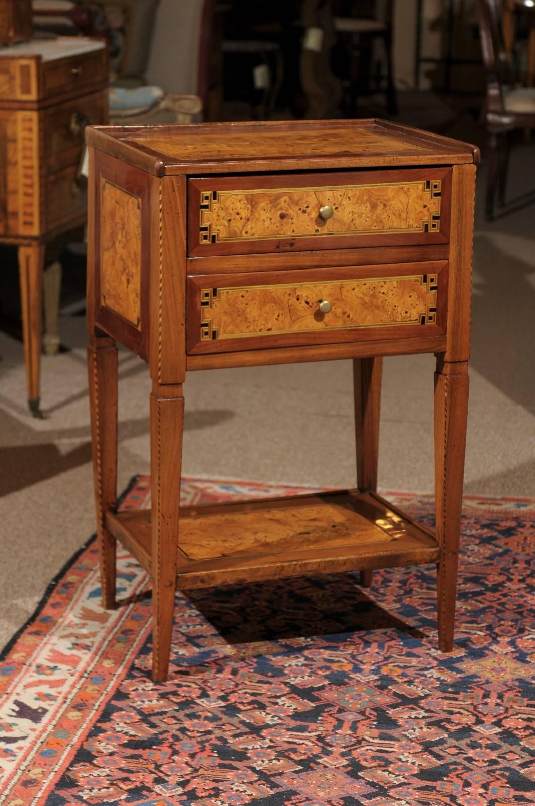 Late 18th century French two-drawer table in burled yew, walnut and fruitwood, circa 1790.