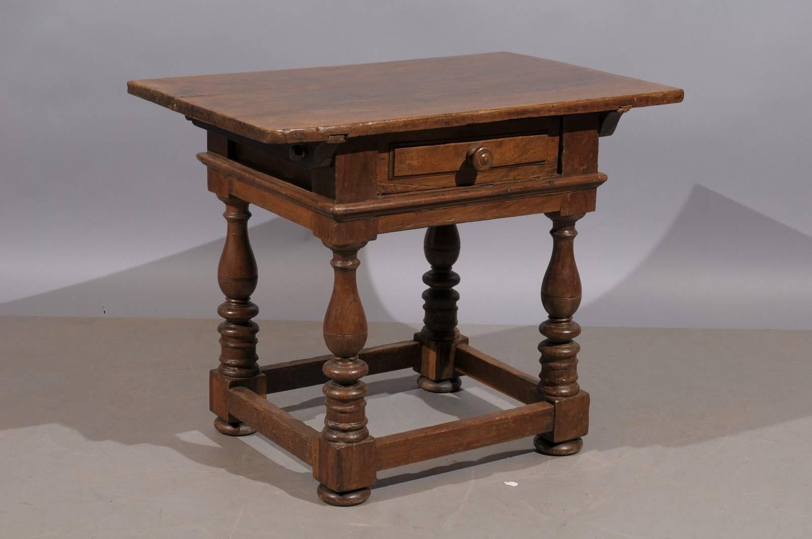 18th century Louis XIII style low side table with drawer and turned legs.