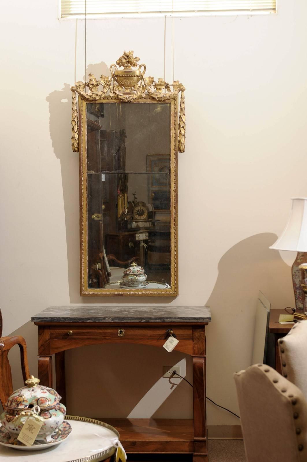 Large 18th Century French Louis XVI Giltwood Mirror with Urn Crest & Laurel Swag In Excellent Condition In Atlanta, GA