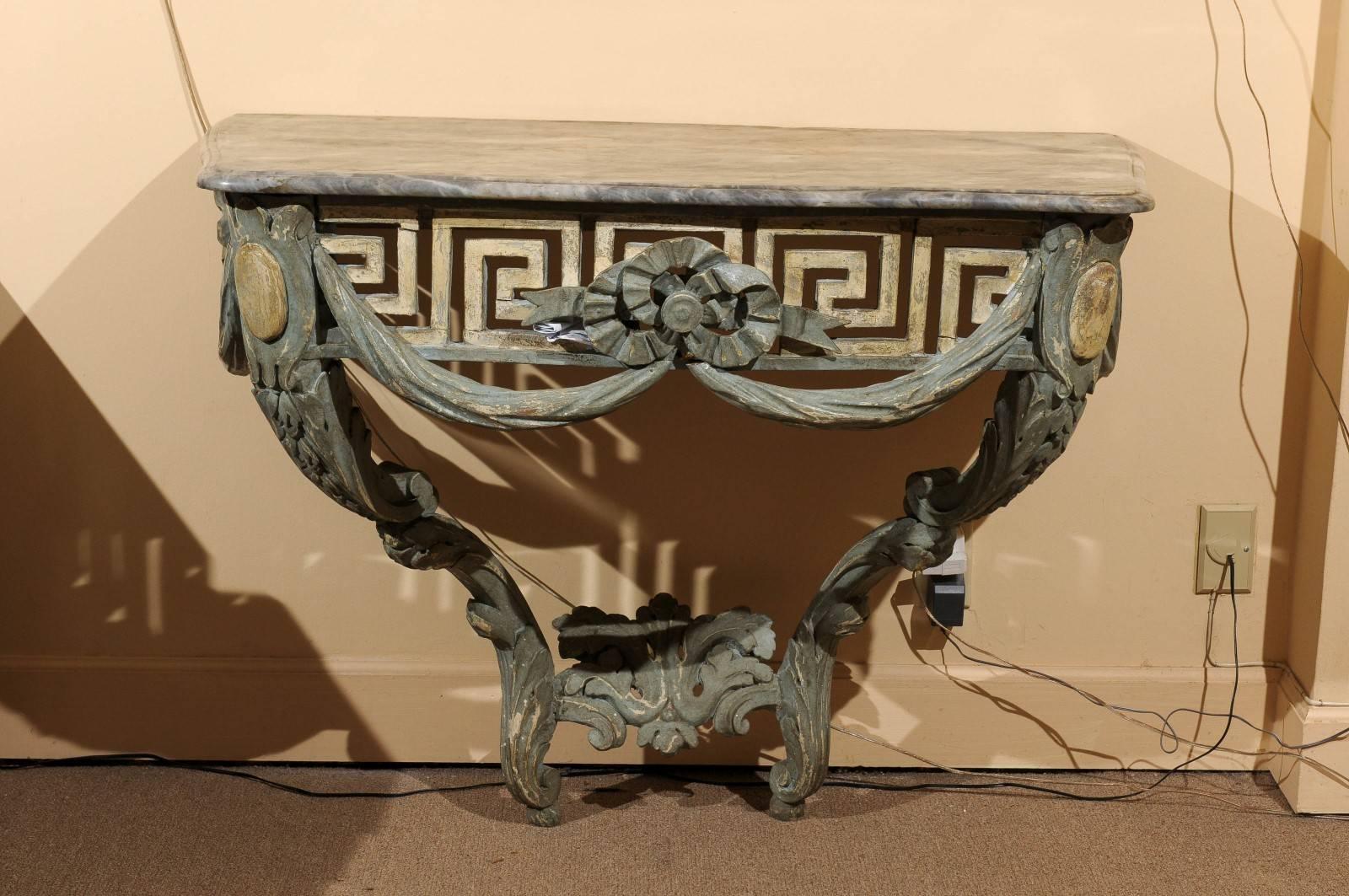 Polychrome painted console with pierced Greek key frieze and grey marble-top, France, circa 1790.