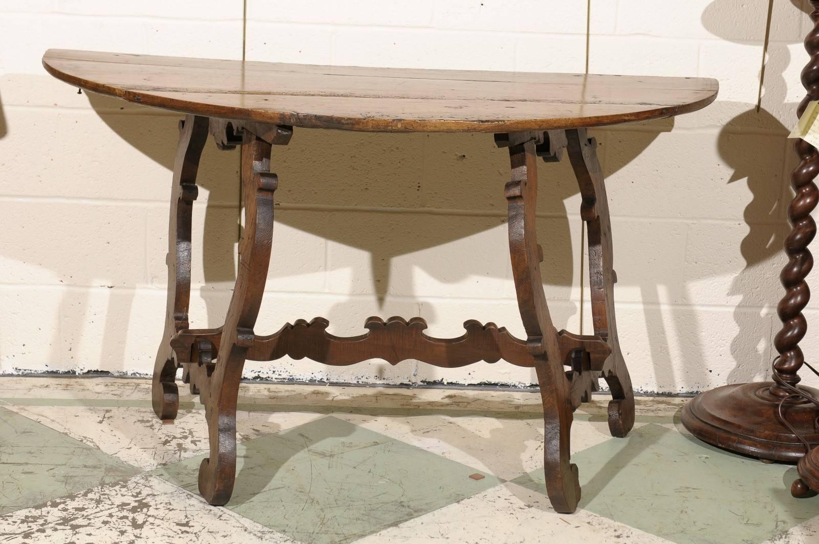 Pair of 18th century Italian walnut D-shaped console tables.