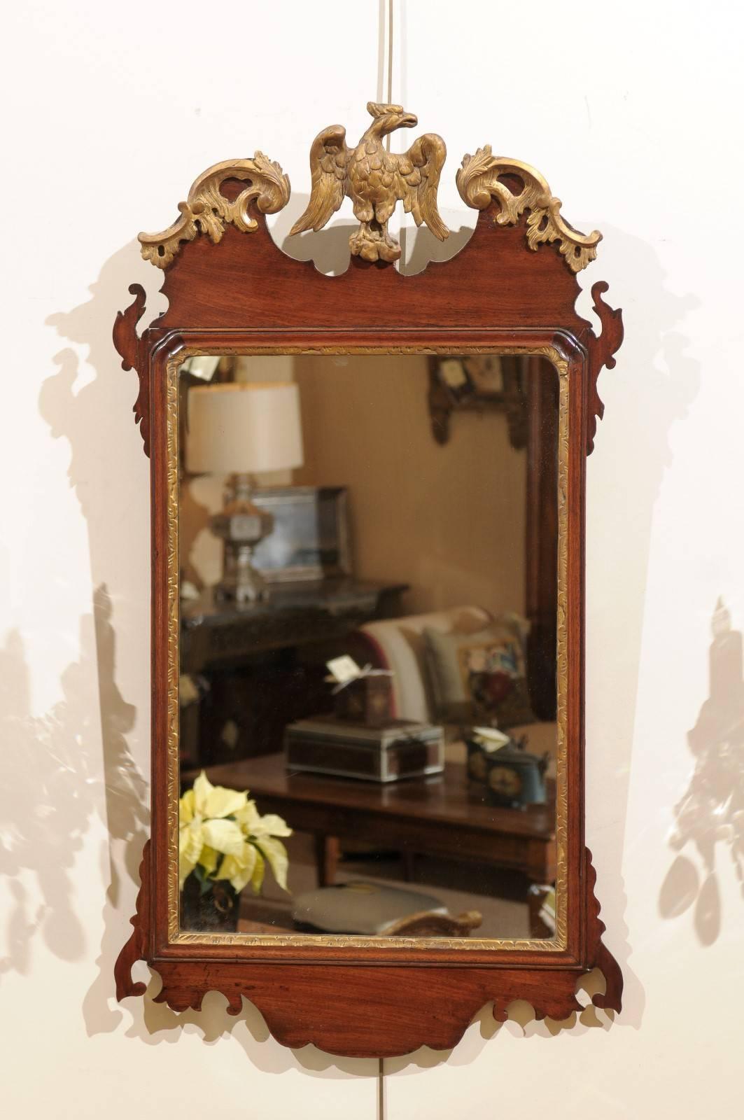English Chippendale mirror in mahogany with eagle crest, circa 1750.