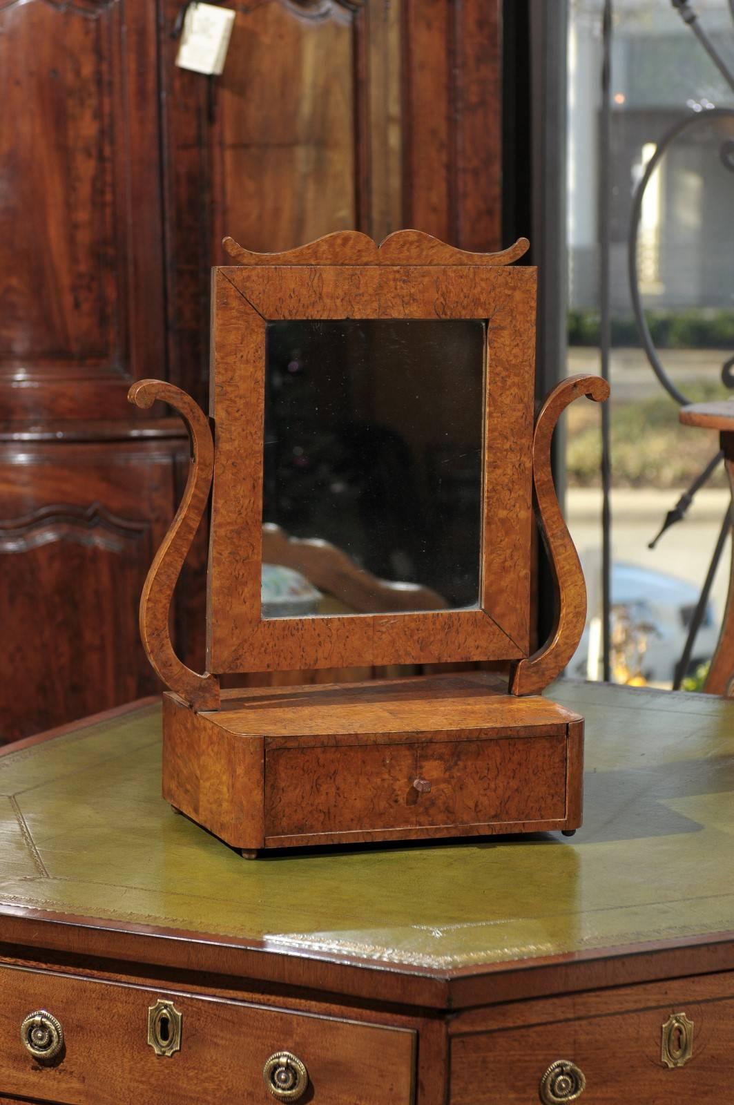 Biedermeier dressing mirror in burled birch, Sweden circa 1810. Table mirror with one (1) drawer.