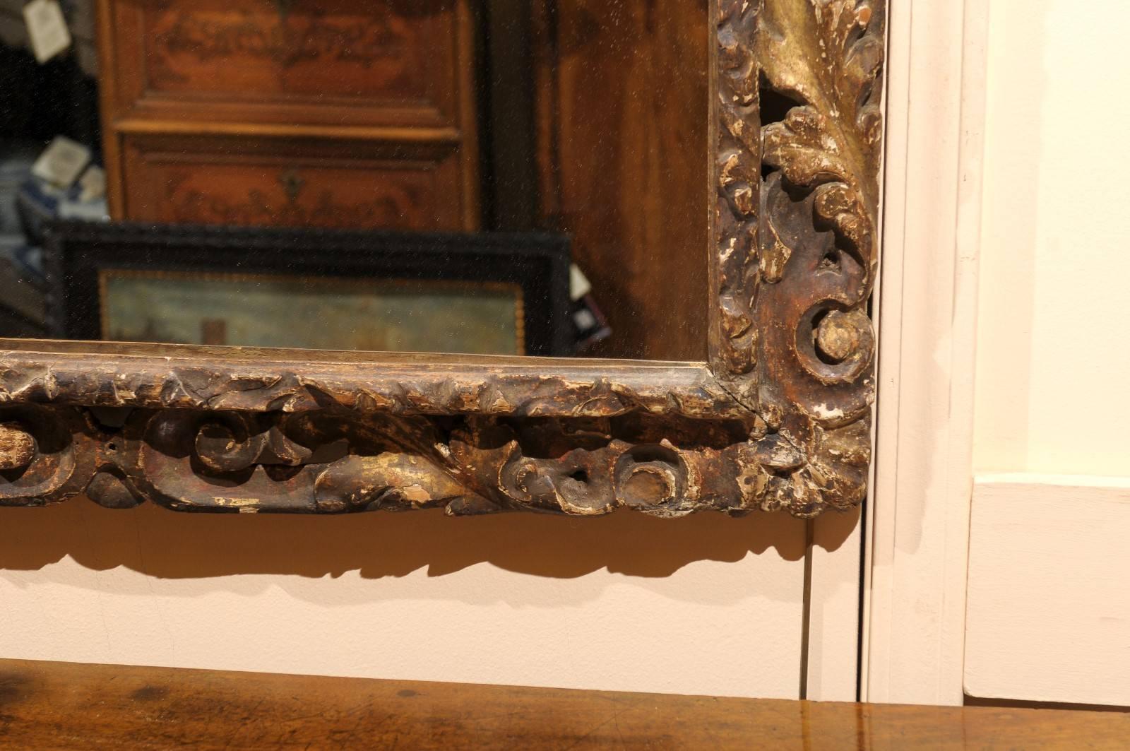 17th Century Italian Giltwood Framed Mirror with Acanthus Leaf Detail In Excellent Condition In Atlanta, GA