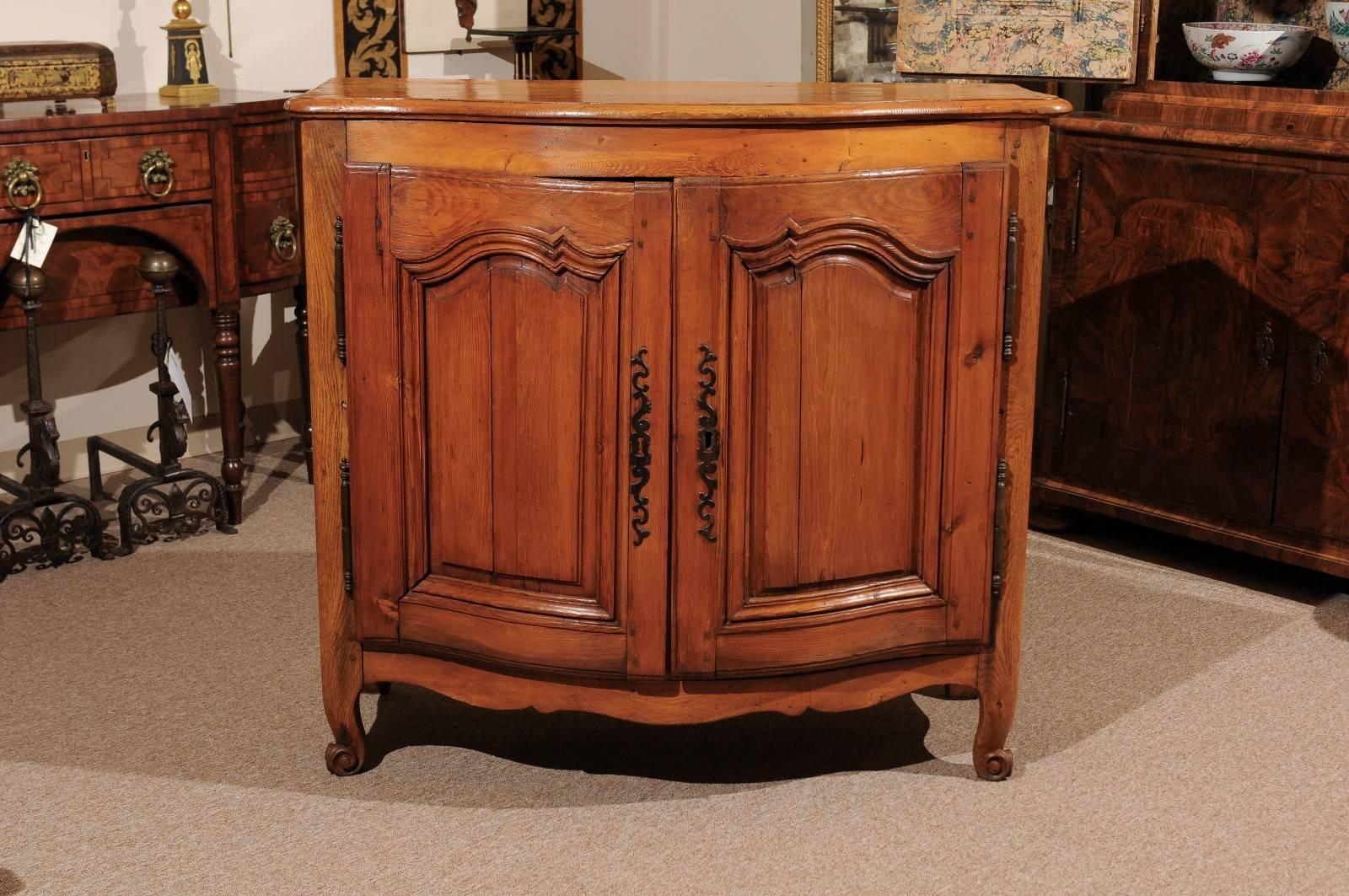 Louis XV style buffet in pine with serpentine front and two (2) cabinet doors, 19th century, France.
