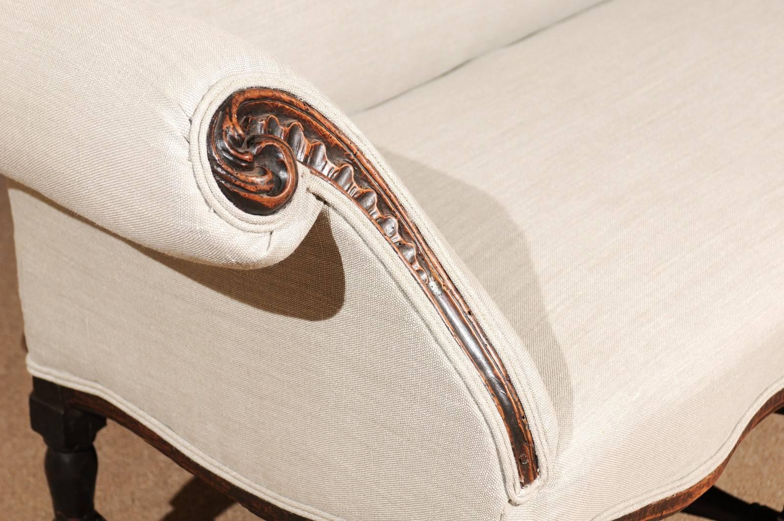 Carved 18th Century Italian Rococo Walnut Sofa with Linen Upholstery