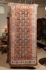 Kurdish Runner with Geometric Patterns in Brown, Blue, Red, Yellow, and Orange