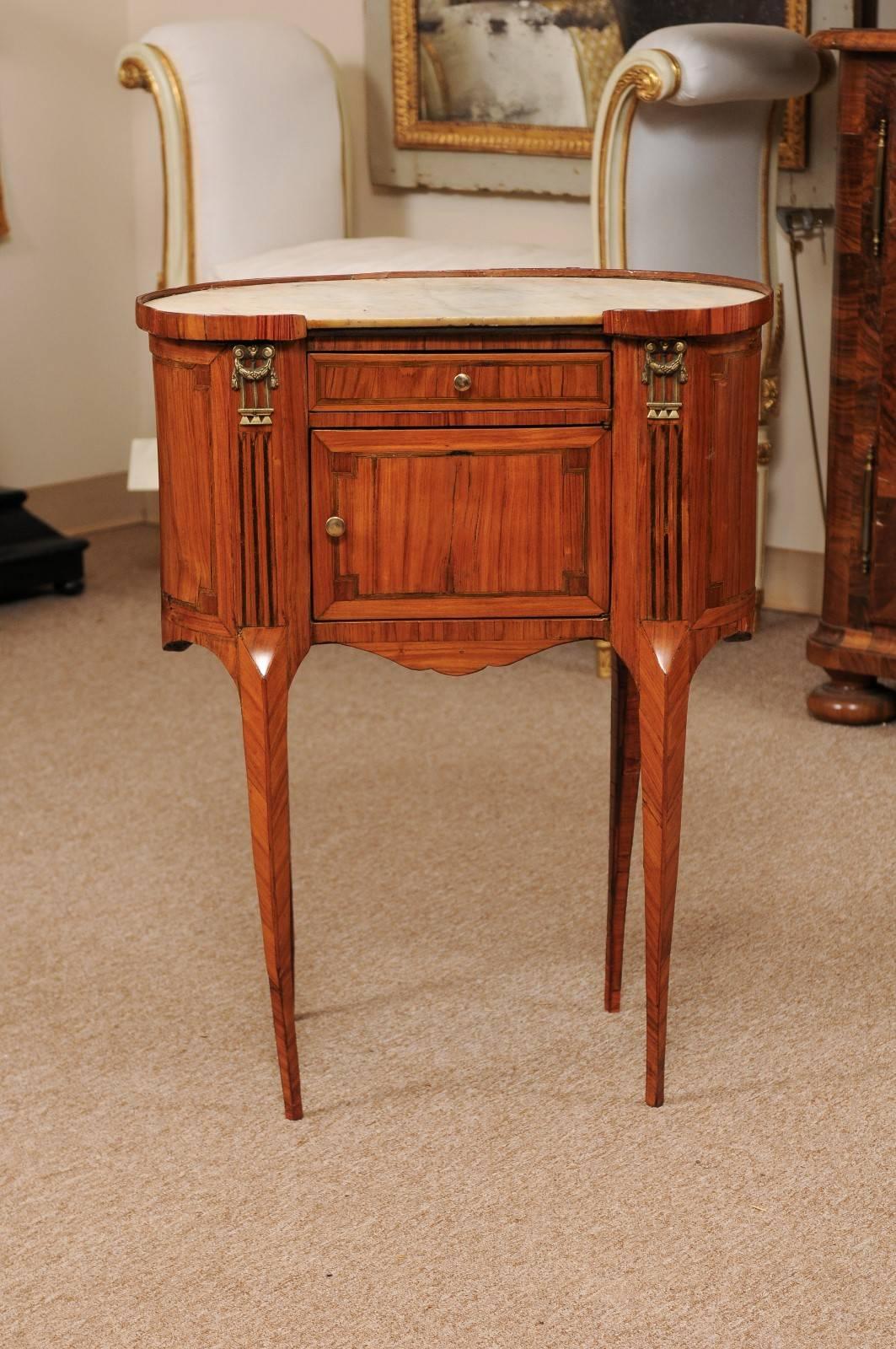 18th century French Louis XVI period kidney shaped tulipwood table with drawer, cabinet door, & marble top.