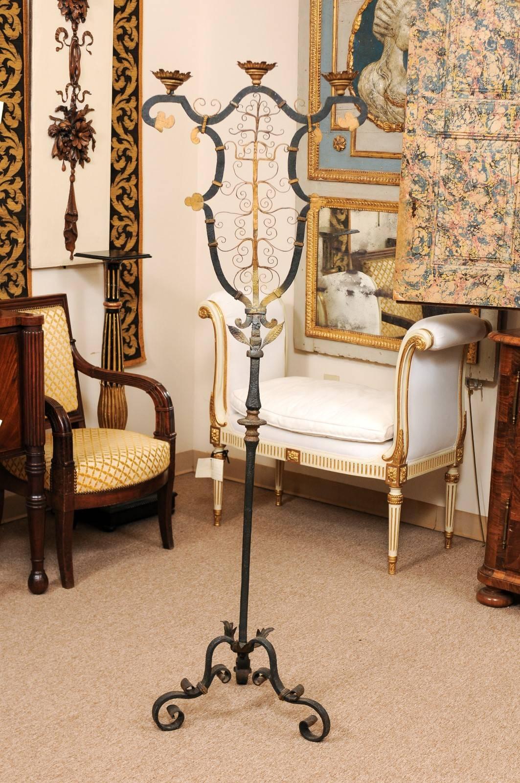 French wrought iron floor candelabra with gilt paint accent, ca. 1900.