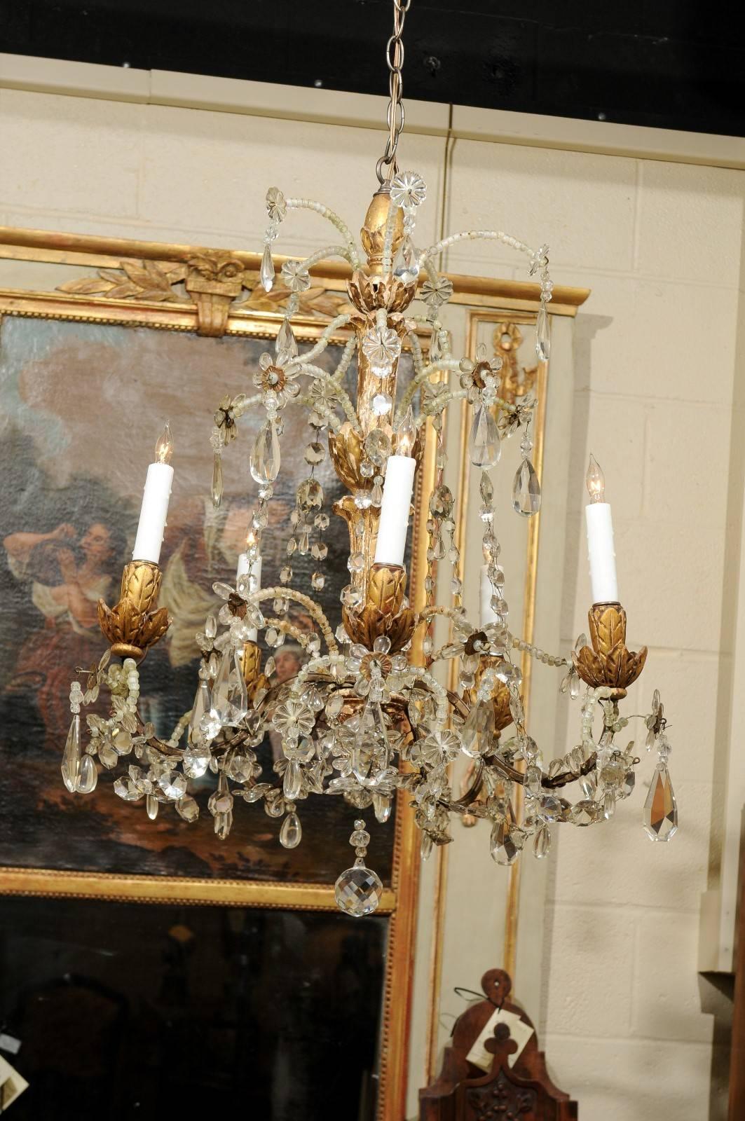 19th century giltwood and crystal chandelier with six light and flower detail. 

William Word Fine Antiques, Atlanta's source for antique interiors since 1956. 

 