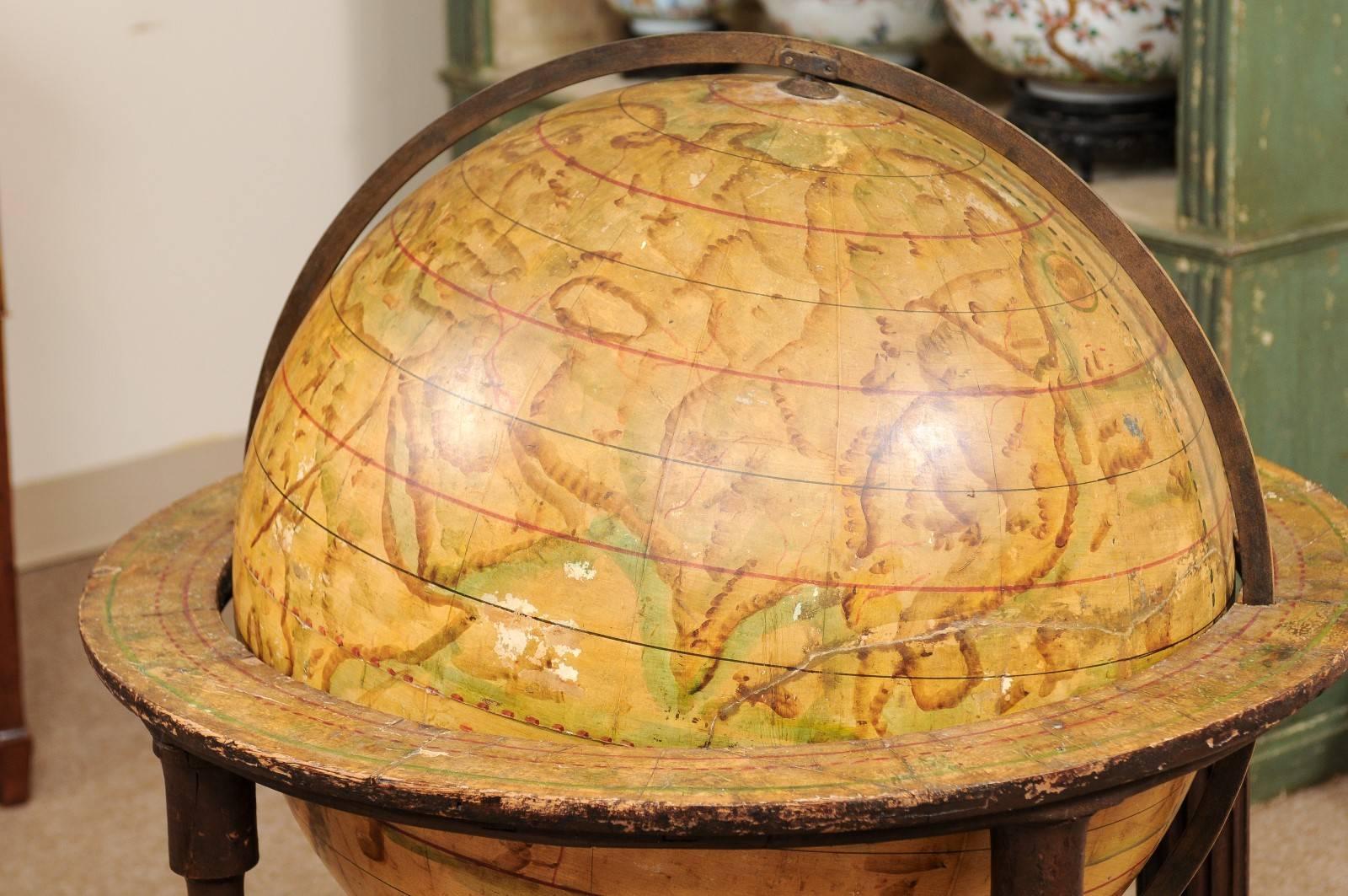 globe with wooden stand