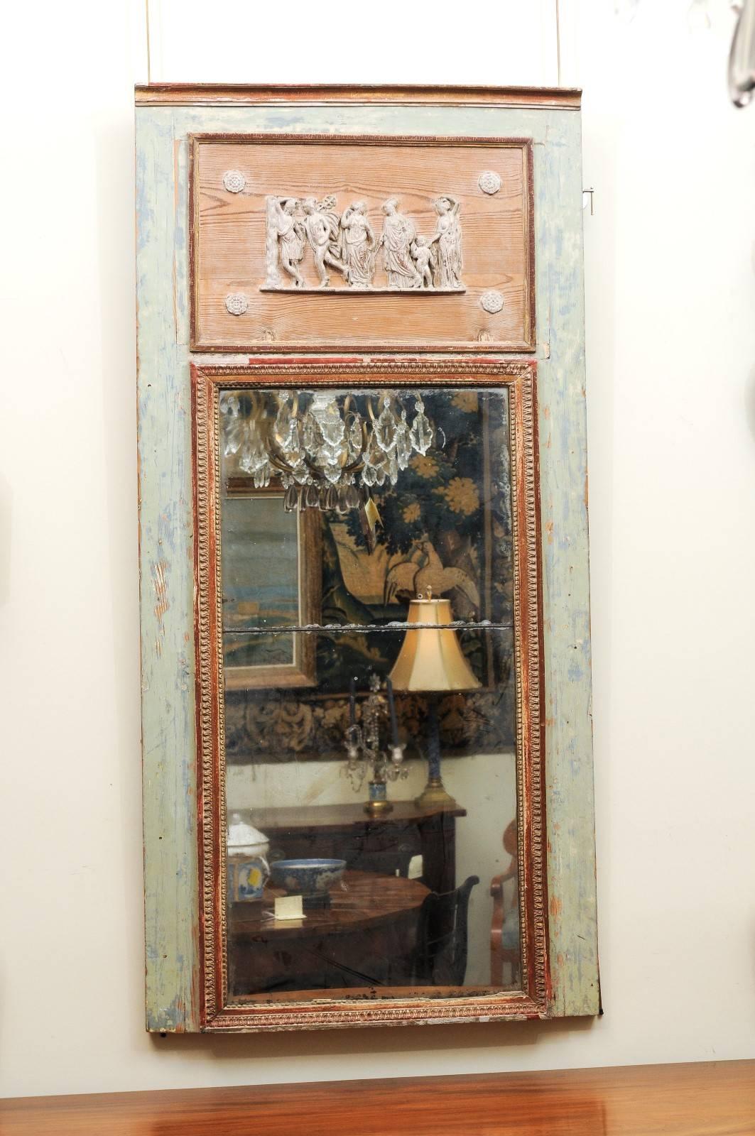 The French neoclassical style trumeau mirror with horizontal rectangular mirror plates surrounded by gilt/gesso molding. Above the mirror with Roman figural plaster motif within pine panel. The outer frame with painted pale green finish.

 