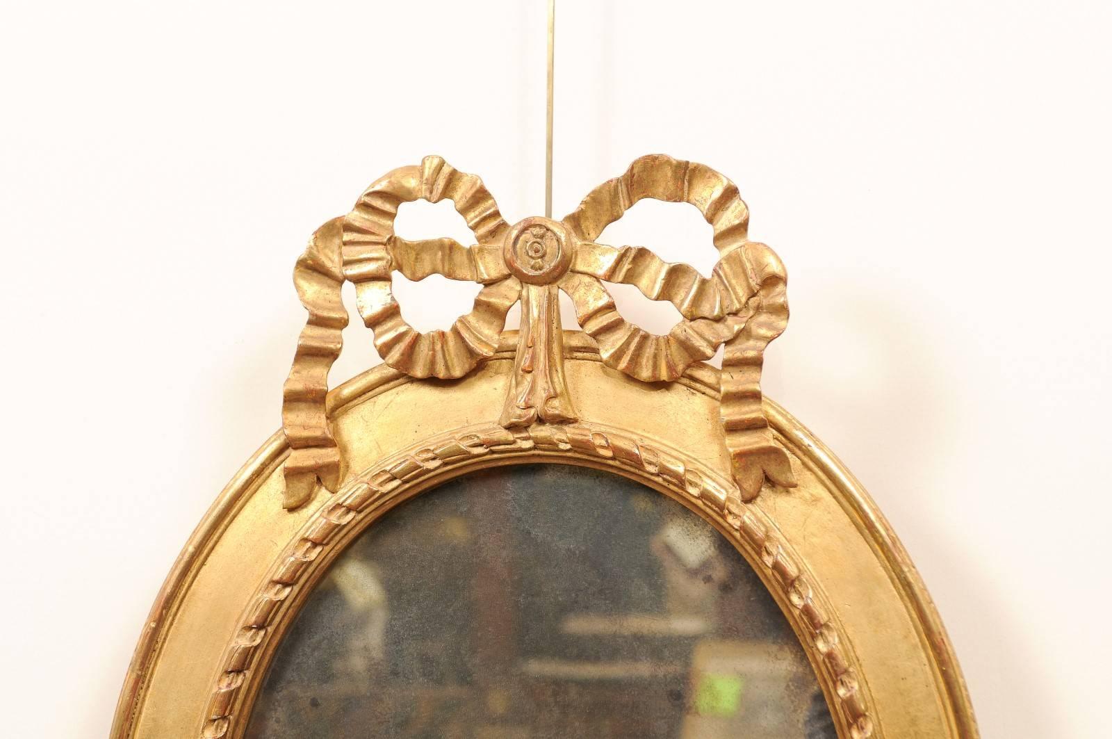 Pair of Giltwood Oval Bow-Topped Mirrors, 20th Century In Good Condition For Sale In Atlanta, GA