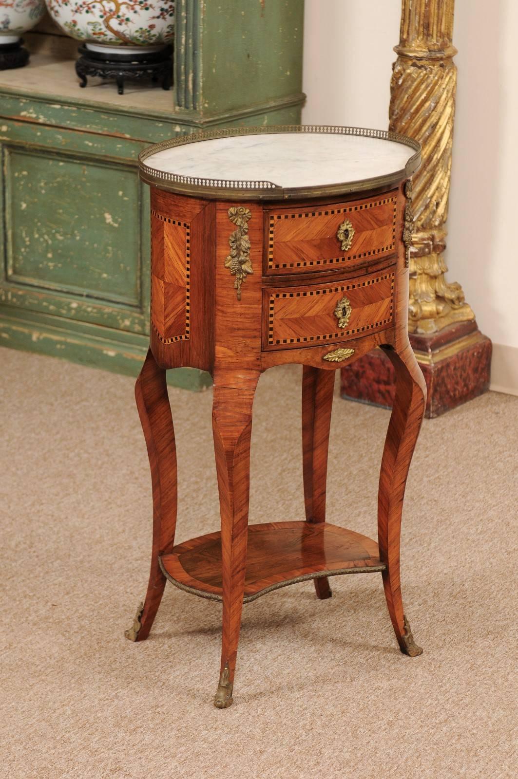 Ormolu 19th Century French Inlaid Tulipwood Chevet with Oval White Marble Top For Sale