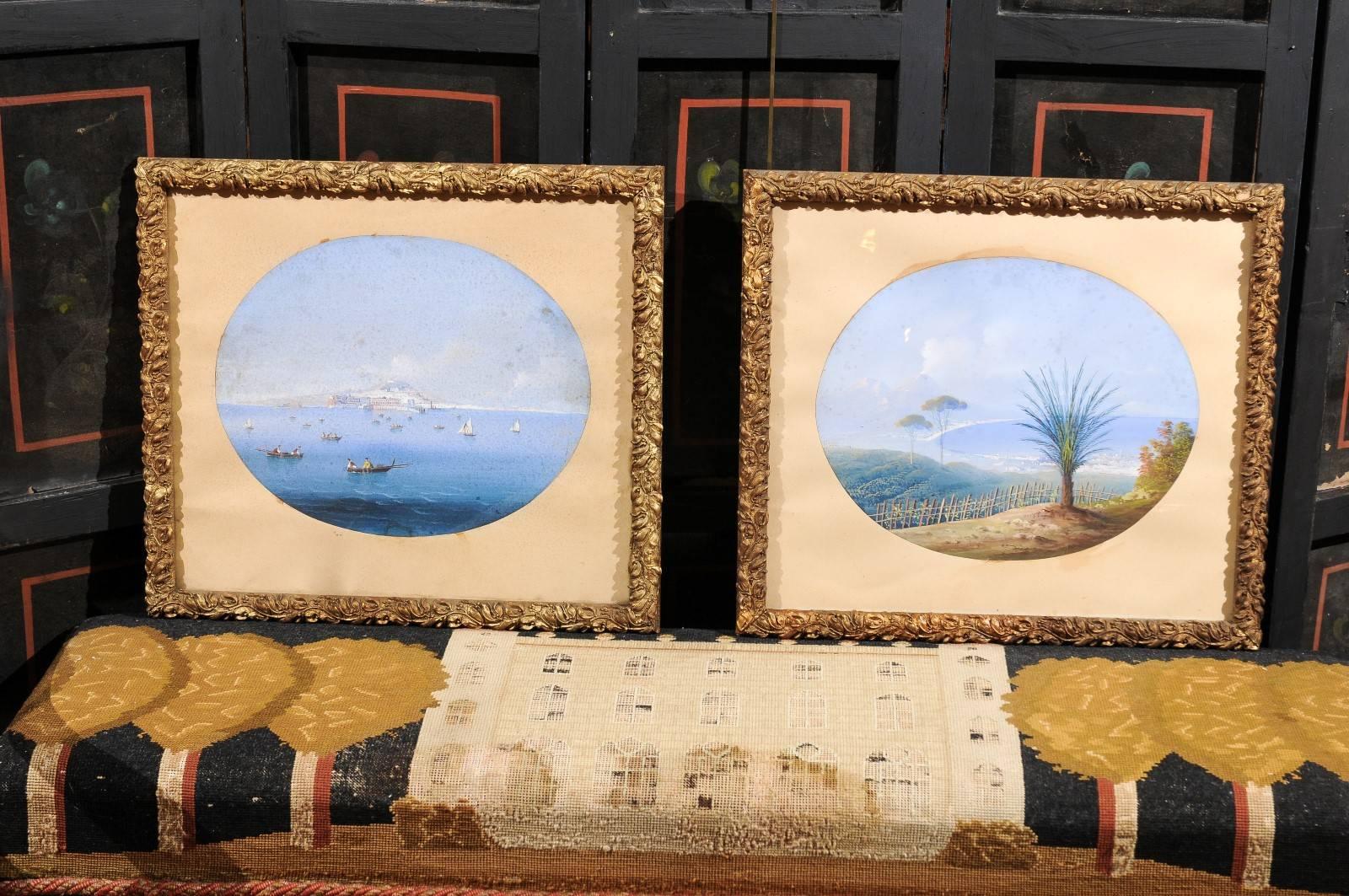 Pair of Gouache seascape paintings with carved giltwood frames featuring foliate motif and cream colored oval mattings, Italian 19th century.