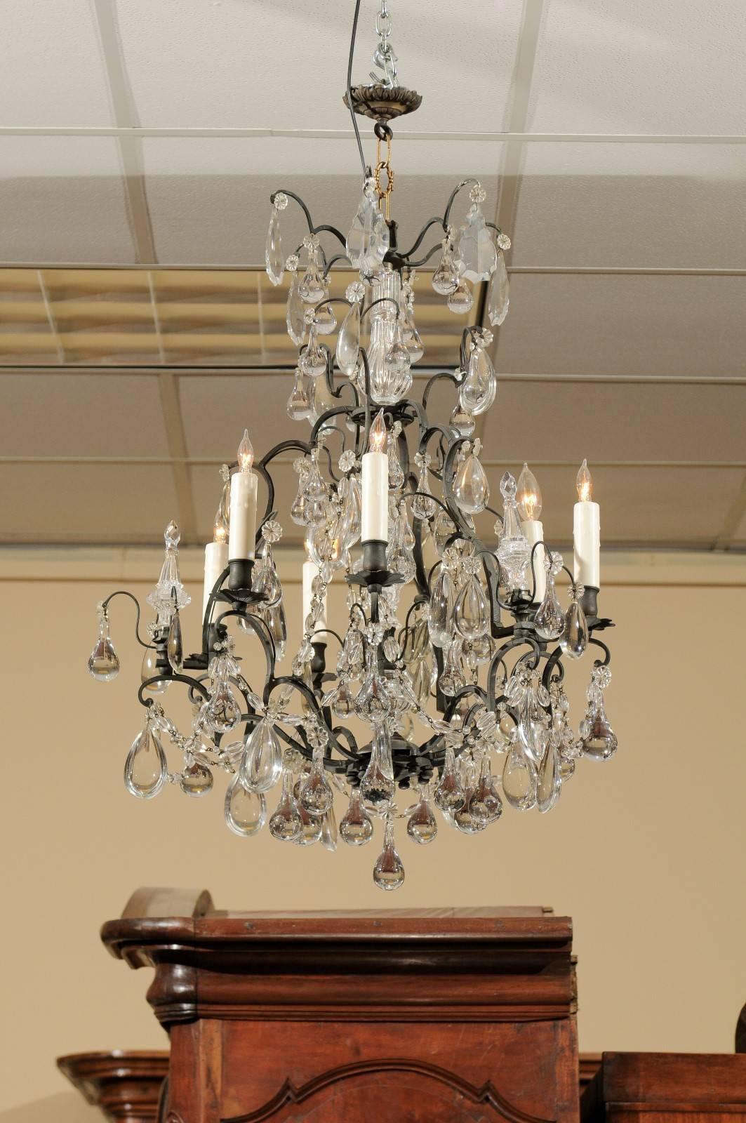 Louis XV style 6-light chandelier with black metal frame, clear crystals & drops, France circa 1890.