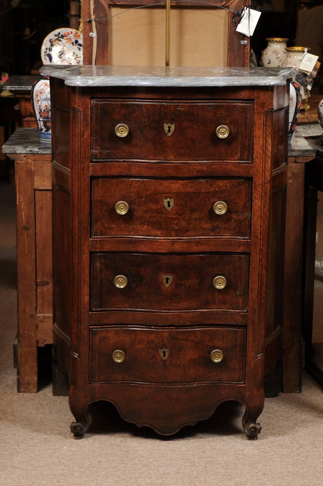Louis XV period 4-drawer walnut tall commode with serpentine front, shaped apron, cabriole feet, and gray marble top.