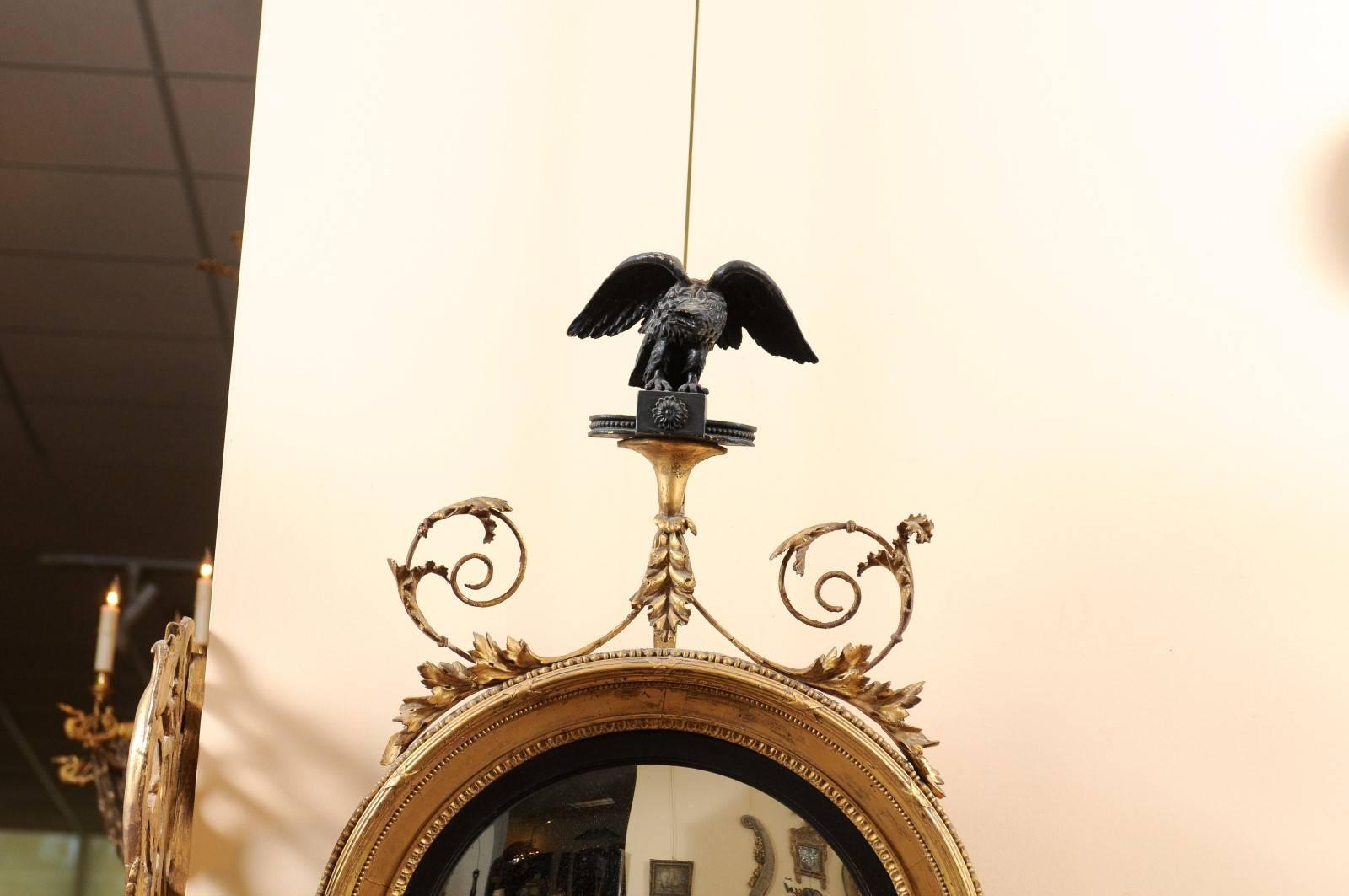 English Regency Giltwood Bullseye Convex Mirror with Eagle Crest, circa 1820 In Good Condition In Atlanta, GA
