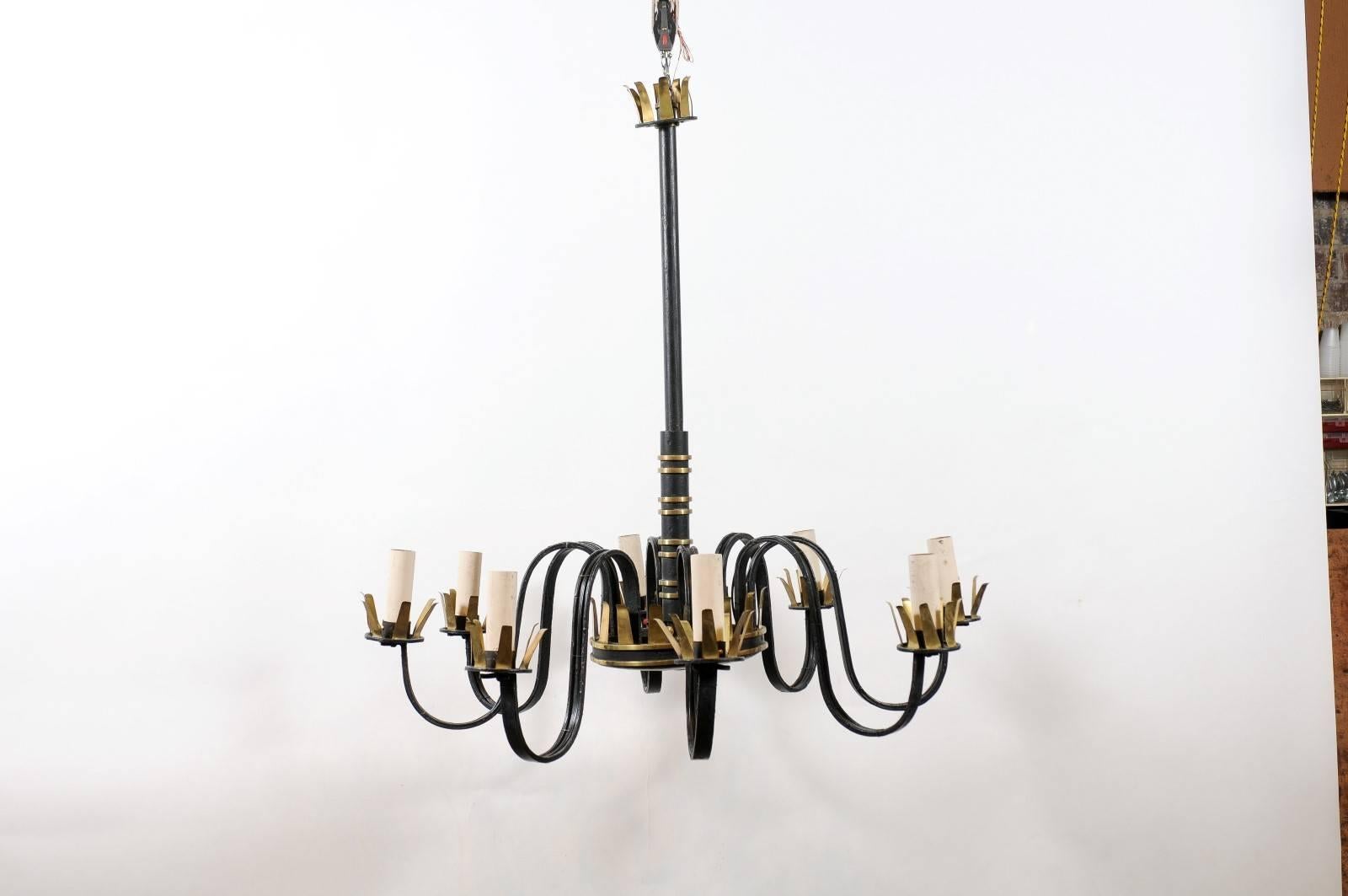 Iron chandelier with gilt accents and eight lights. 

William Word fine antiques: Atlanta's source for antique interiors since 1956. 

 