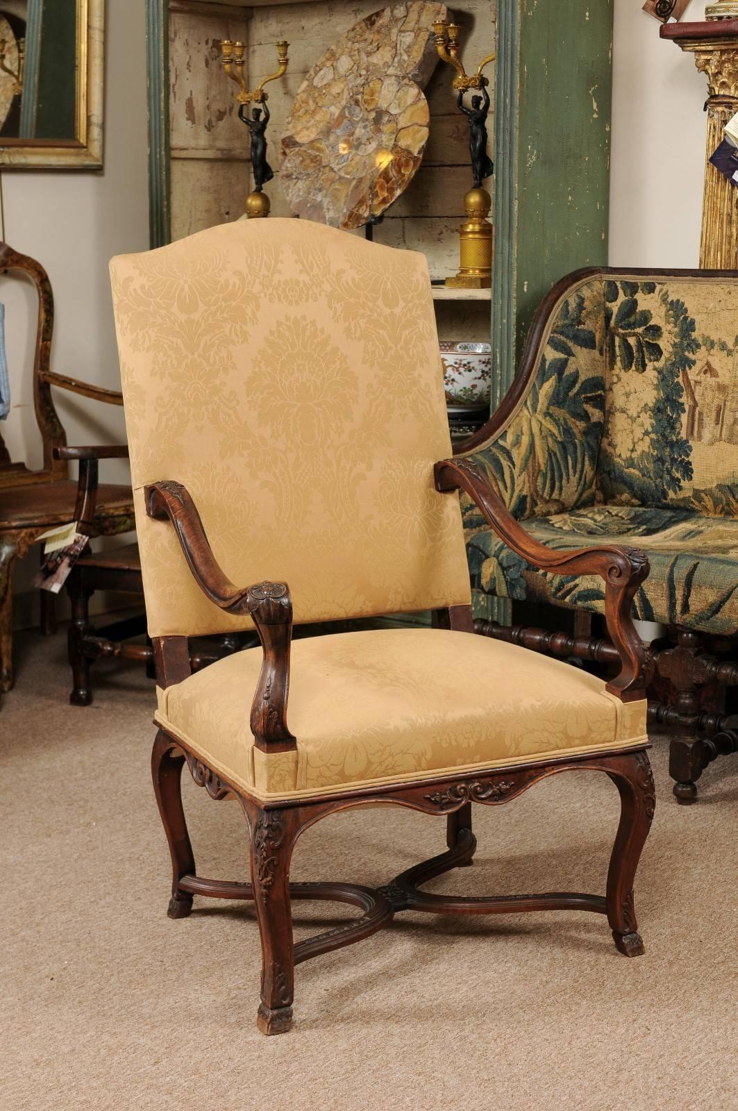 18th century French Regence period walnut fauteuil / open arm chair.