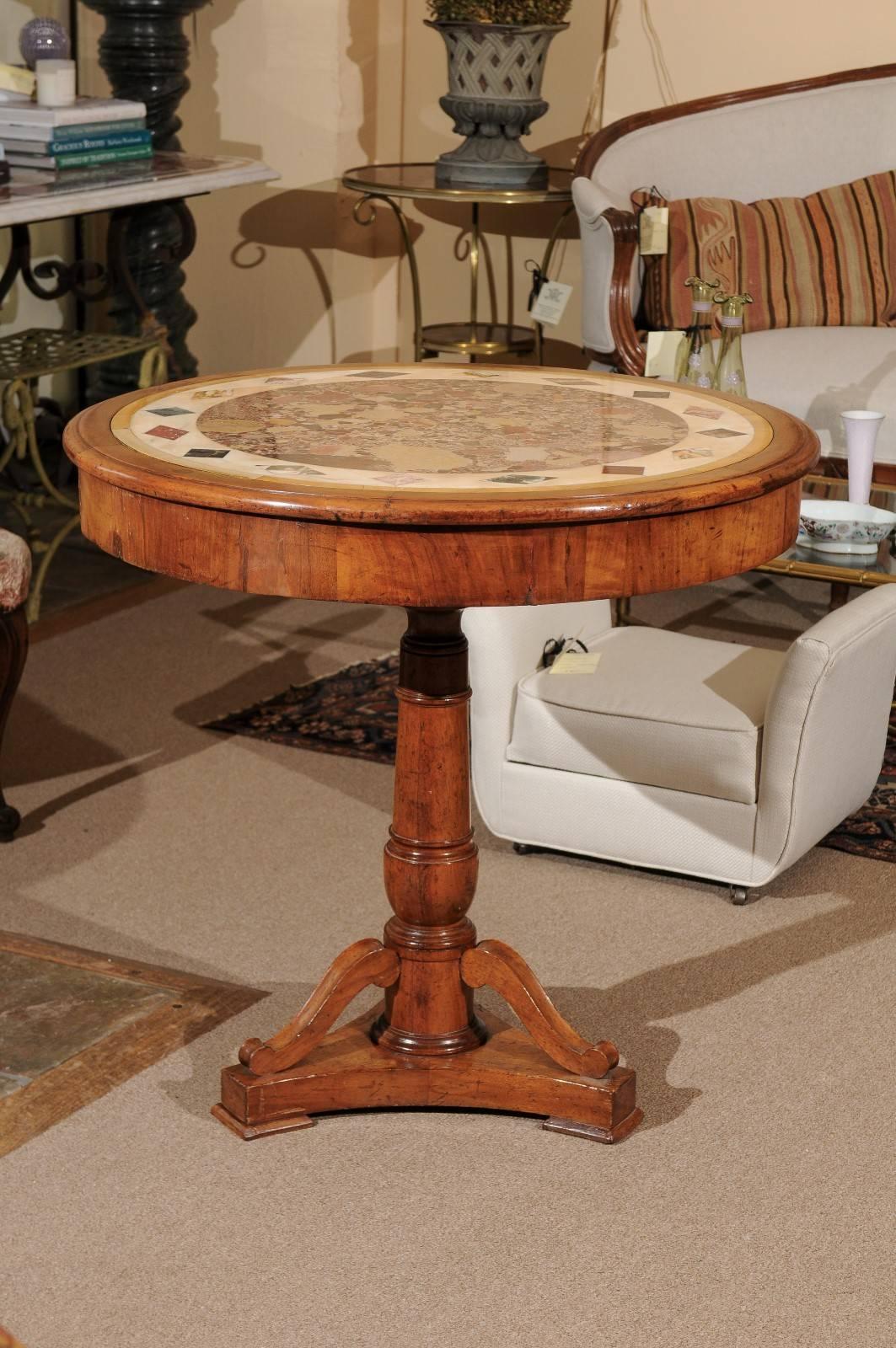 Walnut gueridon with inset specimen marble top and later base. 

William Word Fine Antiques: Atlanta's source for antique interiors since 1956. 

 