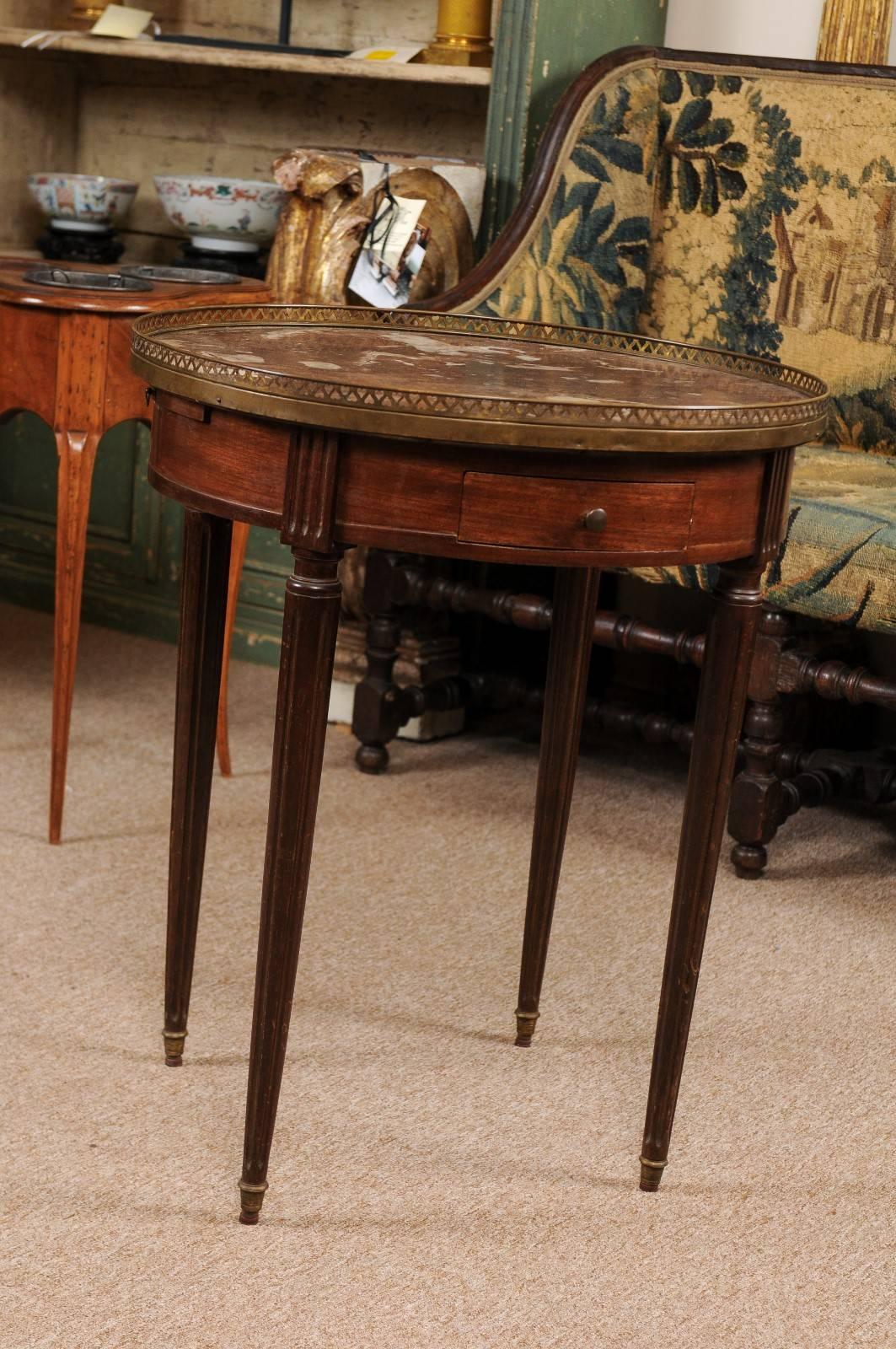 Louis XVI style Bouillotte table in mahogany with fluted legs and 