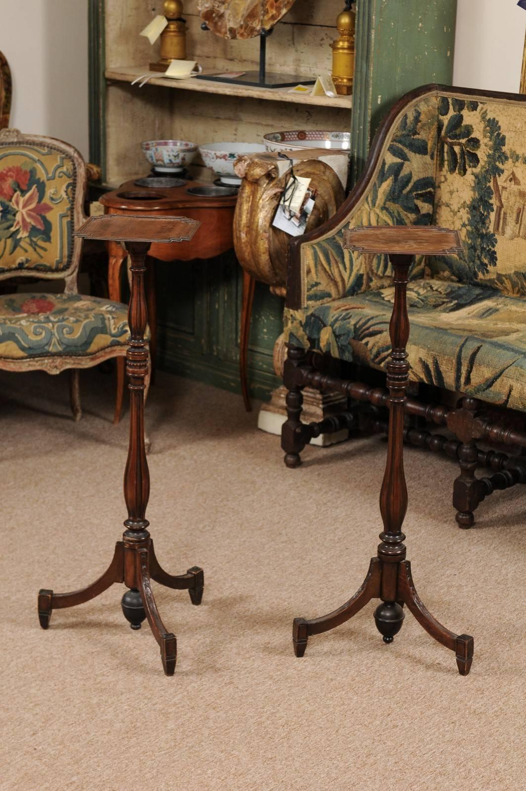 Pair of English George IV style mahogany candle stands, late 19th/early 20th century.

 