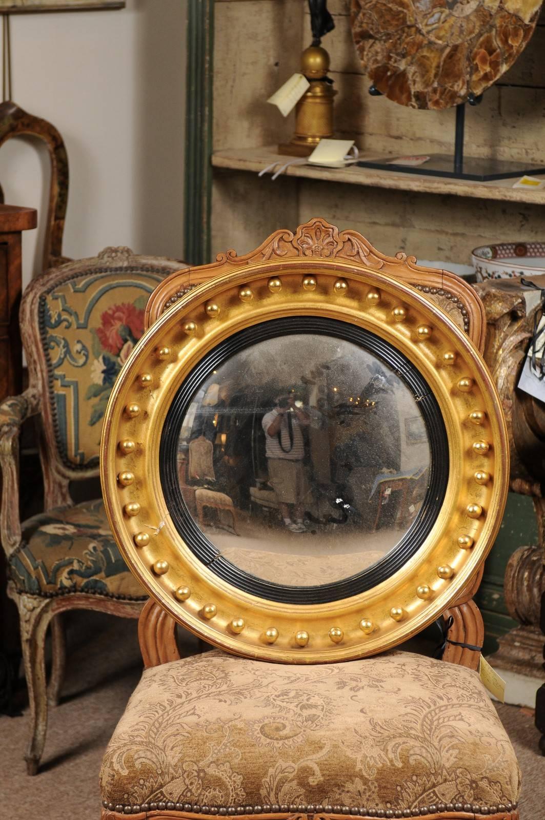 Carved 19th Century English Giltwood Bullseye Mirror with Ebonized Detail