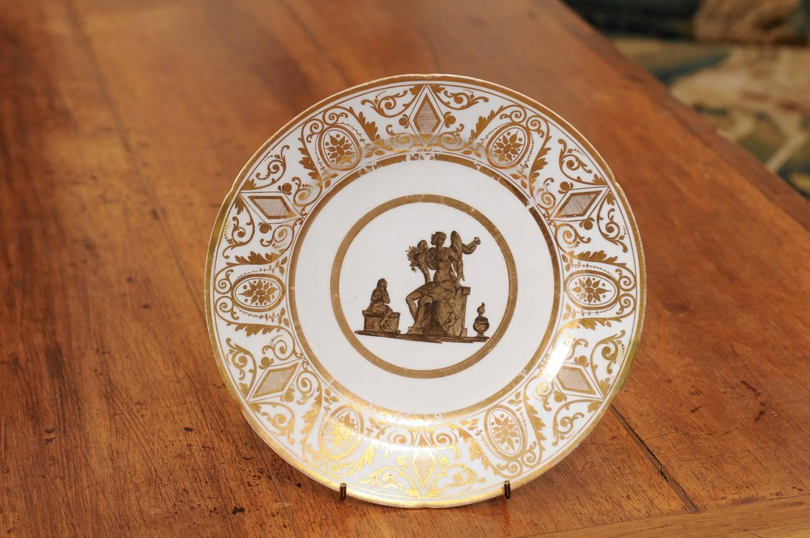 A London decorated neoclassical coalport plate with grisaille Roman scene and gilt decoration.