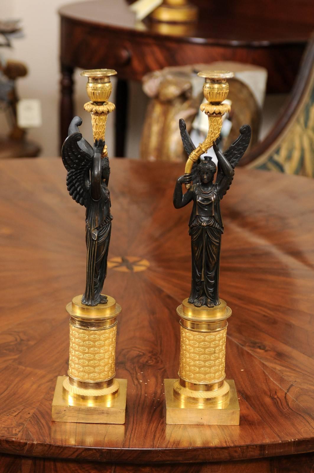 Bronze Pair of Empire Candlesticks with Patinated Figures, France, 19th Century For Sale