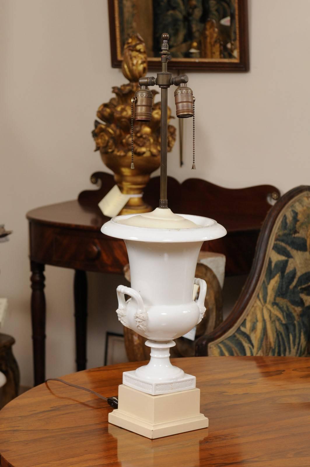 European Pair of Neoclassical Style White Porcelain Urns, Wired as Lamps, 19th Century