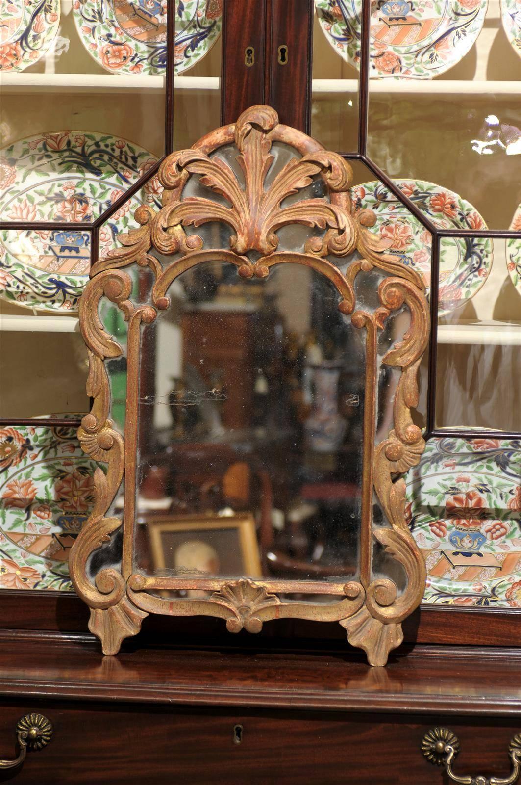 Small 18th century French Louis XV mirror.